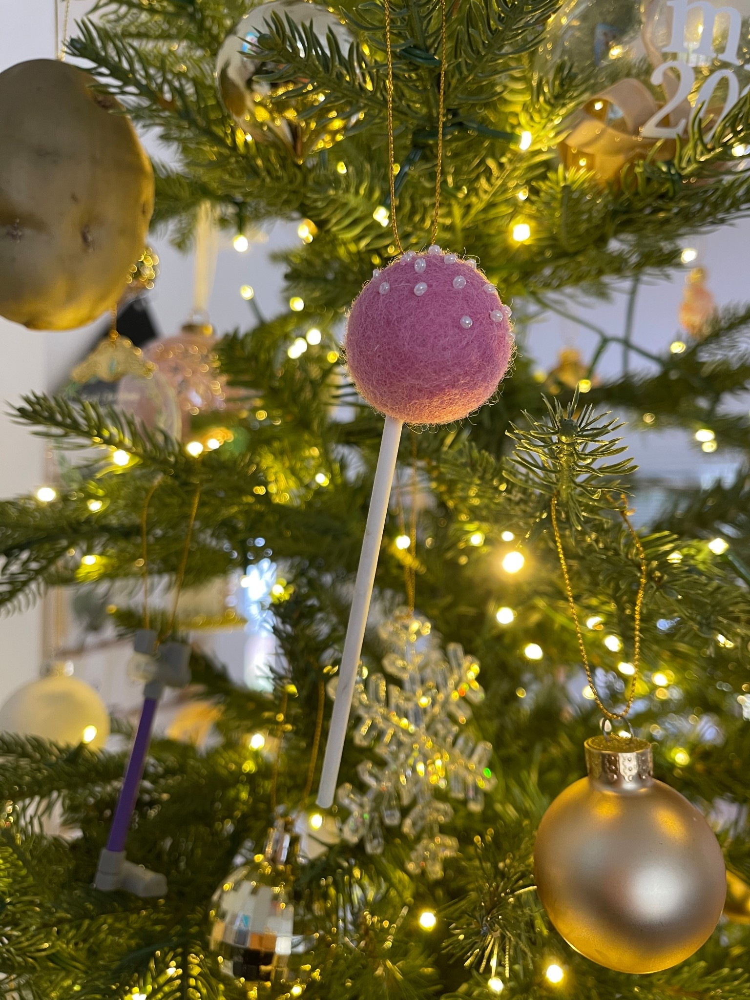 The cutest felt cake pop that I added string to to make it a custom ornament for my son’s collection. Also so cute for play kitchens!

#LTKKids #LTKHoliday #LTKBaby