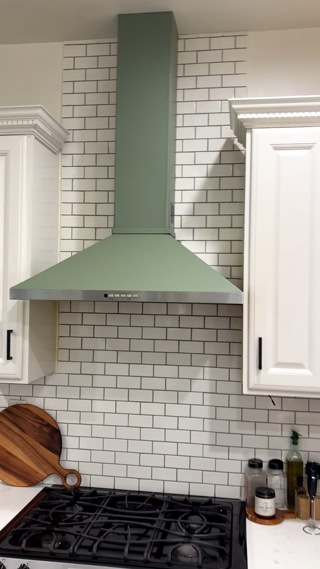 An easy, noninvasive way to change your kitchen’s vent hood color! I used peel and stick wallpaper + thin strips of a magnet to cover seems. What do we think?! 💭 🫶🏽🛠️💚🙋🏻‍♀️

#LTKHome #LTKdayinmylife #LTKvlog