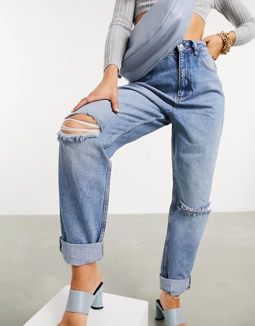 ASOS DESIGN High rise 'Slouchy' mom jeans in midwash with rips | ASOS (Global)