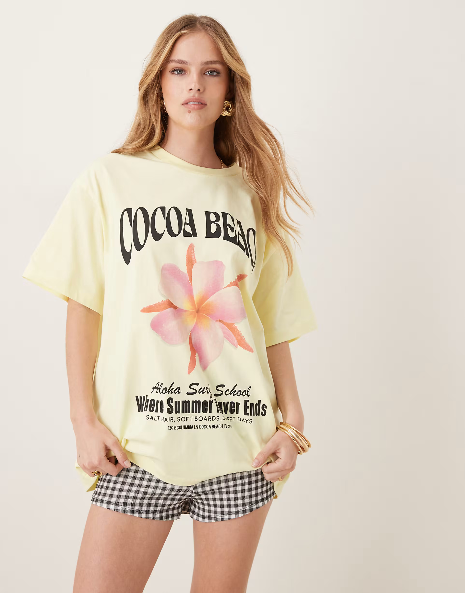 ASOS DESIGN oversized t-shirt with cocoa beach graphic in yellow | ASOS (Global)