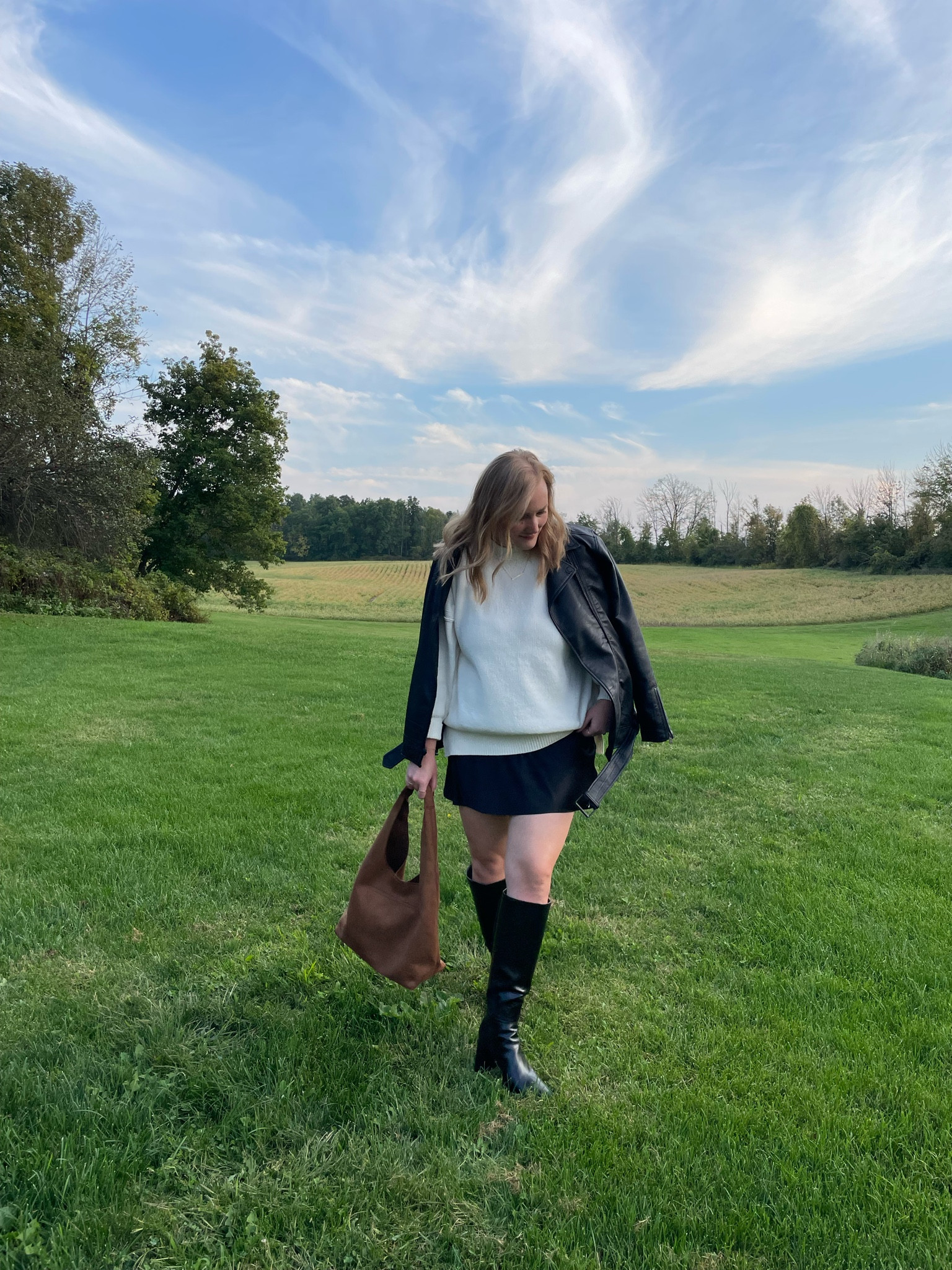 The perfect Fall outfit! Knee high boots, leather boots, mini skirt, satin mini skirt, suede bag, cream sweater, leather jacket  

#LTKFallSale #LTKStyleTip #LTKSeasonal