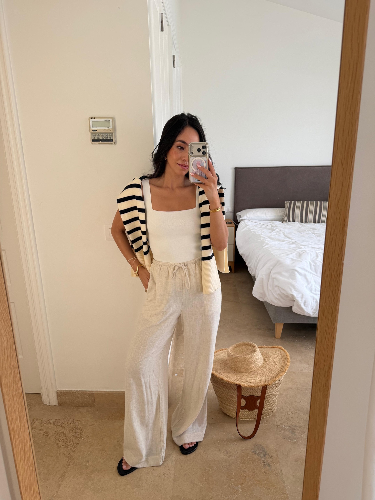 Holiday airport travel vibes 🤍 all cream outfit with a stripe knit, satin trousers 

#LTKspring #LTKstyletip #LTKsummer