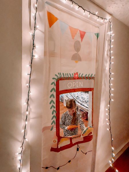 #ad This hanging storefront is sure to be a hit with your little ones! 😍 Encouraging creativity, confidence, and critical thinking, this easy-to-use storefront is loved by both kids and parents. The space-saving design fits right in standard doorways, saving you floor space (which is a huge win for us.) It is beautifully printed on both sides to inspire entrepreneurial pretend play. Installation took me less than a minute. I just hung one Velcro strip, that’s it! It’s also machine washable, which is a huge plus. No more mom guilt for not being able to provide open-ended play areas. This one is an easy YES. Learn more about Swingly Toys and their amazing products on the LTK app! I have linked this product and more in my LTK shop for easy shopping. @swinglytoys #swinglytoys #swinglytoyspartner #pretendplay #openendedplay

#LTKfindsunder100 #LTKkids #LTKfamily