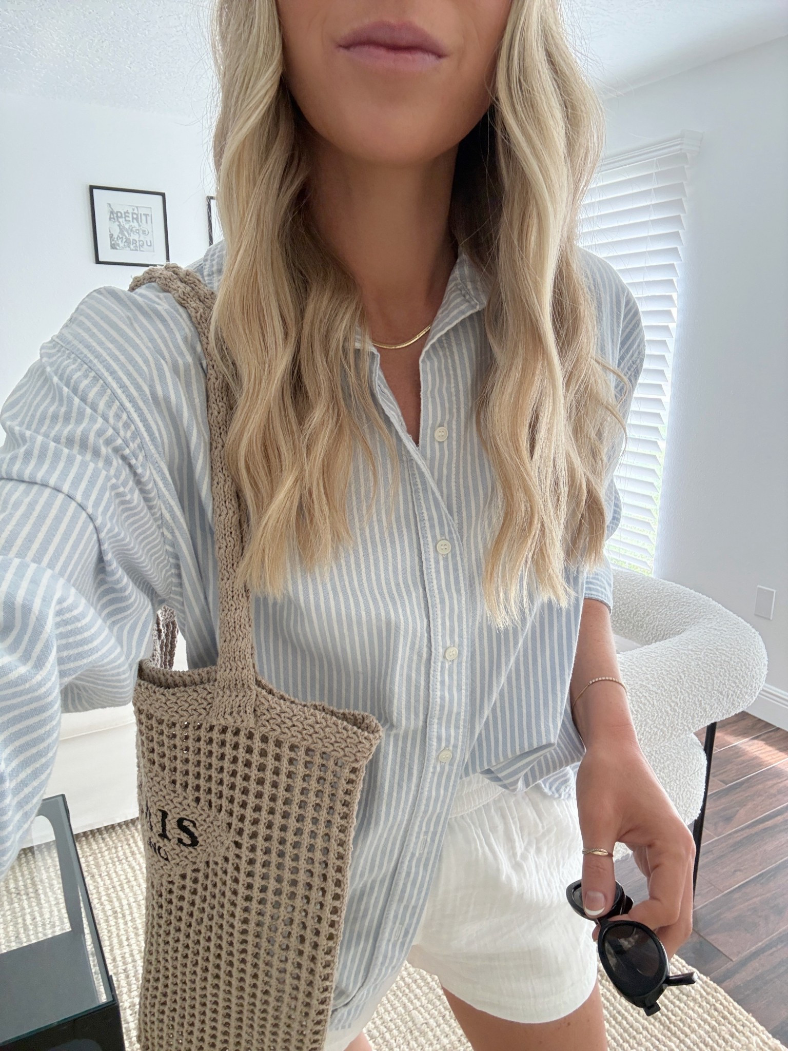 linen shorts on sale with code ‘shopper20'

women’s spring fashion. spring outfit. oversized blue striped button down. white linen shorts. mesh tote bag. oval sunglasses. spring aesthetic.

#LTKootd #LTKSaleAlert