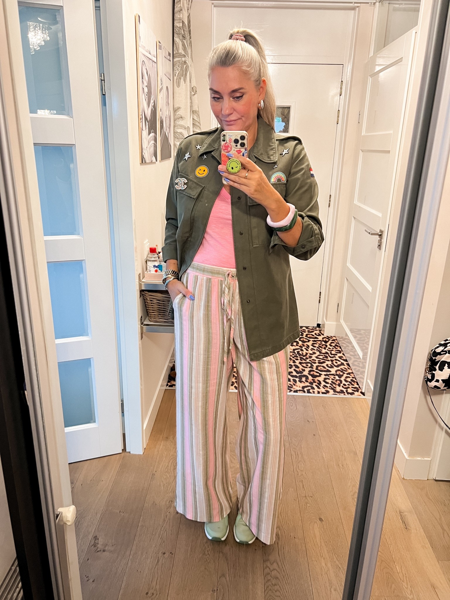 OOTD - Wednesday. Bright pink v-neck top (really old Victoria’s Secret), thrifted Army jacket that I embellished with patches and tall green and pink striped trousers. ‘Bitch Please’ socks and Skechers sneakers. 



#LTKstyletip #LTKnederlands #LTKeurope