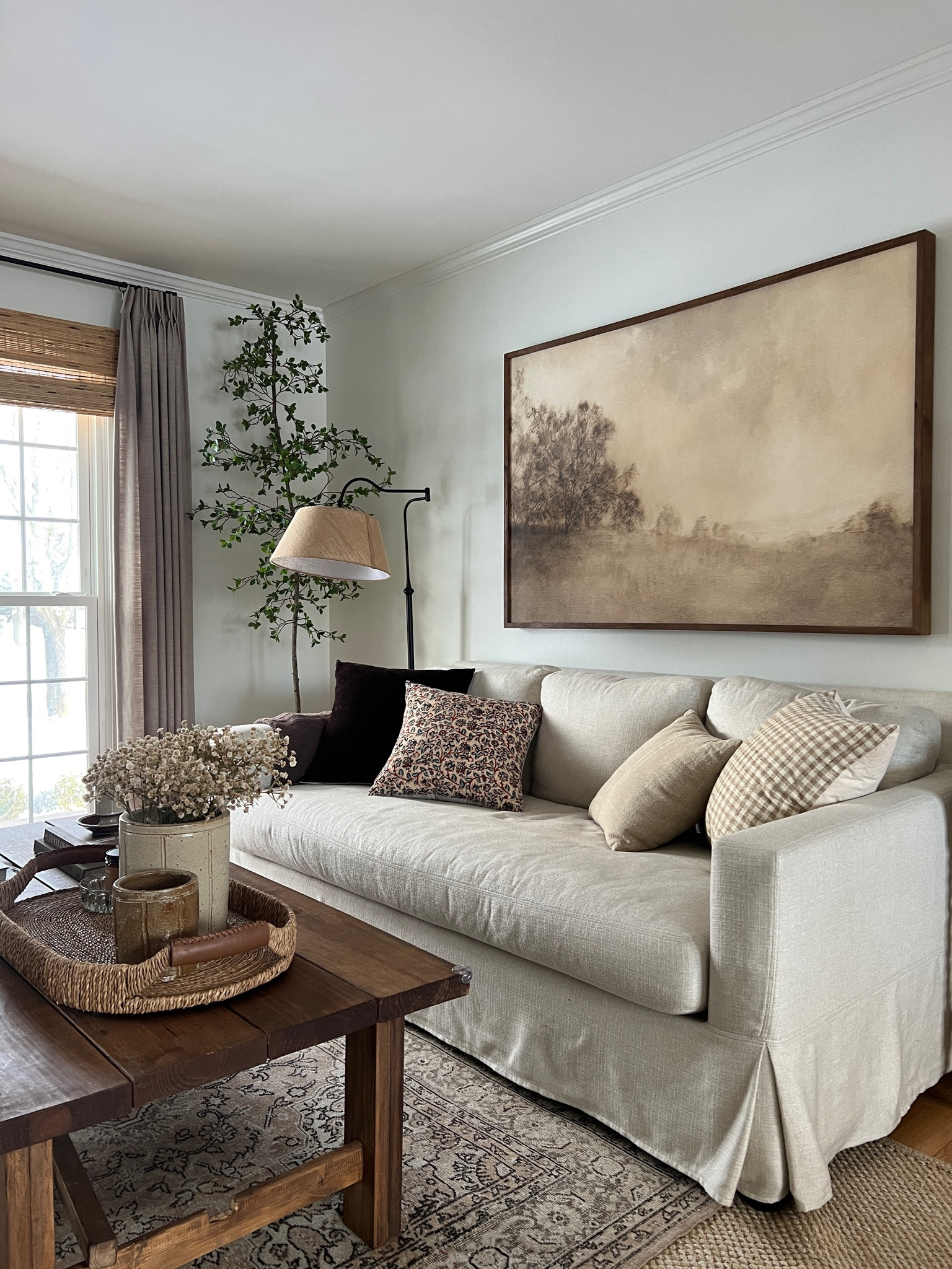 Pottery barn sofa
Slipcovered sofa 
Rug layering 

#LTKHome