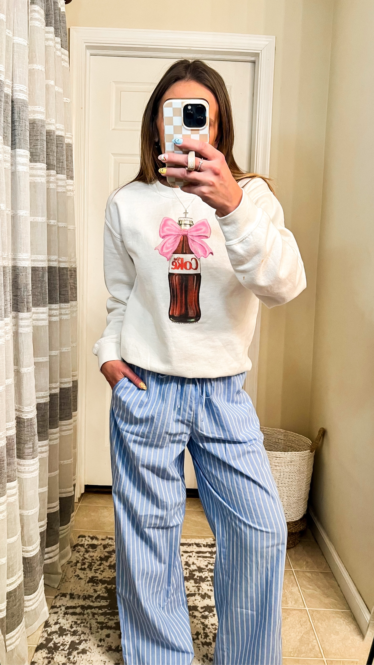 This Diet Coke bow sweatshirt is the cutest thing ever! I’m obsessed and these brandy Melville look alike 100% cotton pj pants from Walmart are viral for a reason! They’re so comfy and fit perfectly oversized!

Wearing size XS in sweatshirt 
Size S in pj pants 

#LTKFindsUnder50 #LTKOver40 #LTKSeasonal