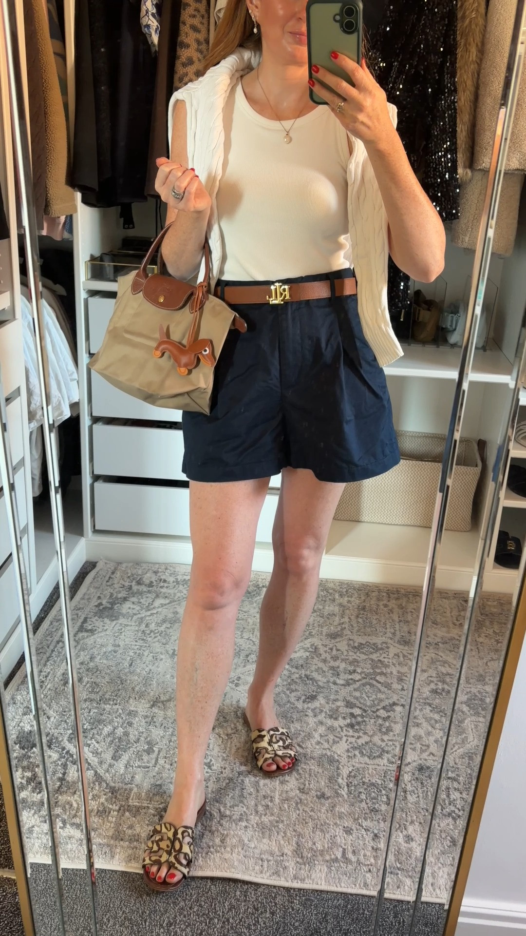 An easy outfit for summer days when I want to feel comfortable but still look pulled together 💙🤍 Classic staples including my go to navy chino shorts, polished details, and a few timeless accessories. @tommy @samedelman @UNIQLO  

 #LTKuk #LTKsummer #LTKluxury