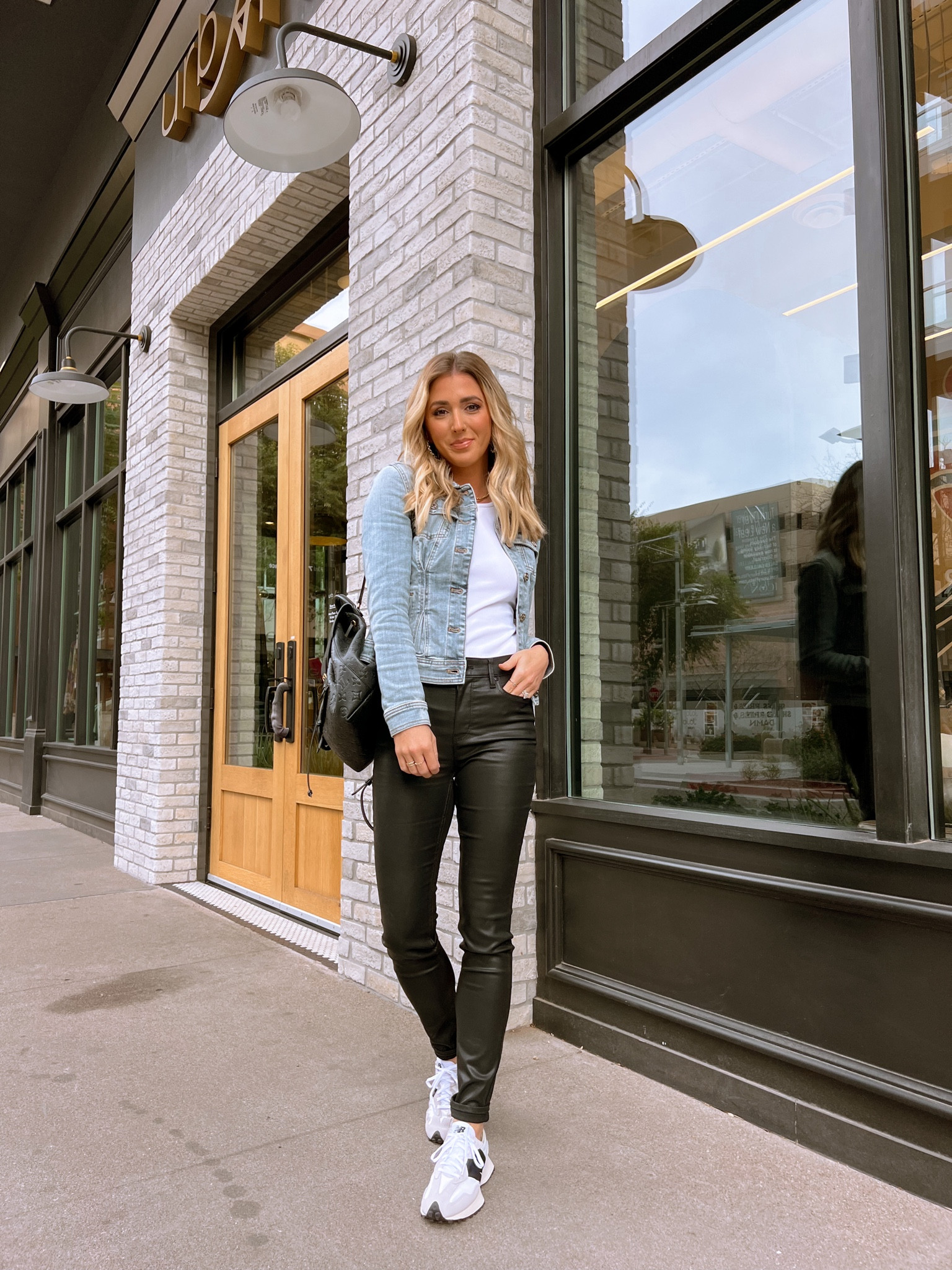 Casual spring transition look!
black coated skinny jeans are a mid to high rise and run true to size (I’m 5’4” in a size 0). They are stretchy and super comfortable.
My white ribbed tank top runs tts.
My denim jacket runs TTS and it has lots of stretch. I’m wearing XS
My new balance sneakers are the perfect neutral sneaker. They run true to size and are perfect for casual outfits.

denim jacket, jean jacket, casual outfit, everyday outfit, sneakers, white sneakers, new balance, white house black market, hoop earrings


#LTKunder100 #LTKshoecrush #LTKstyletip