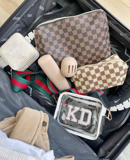 T R A V E L \ my favorite beauty bags from Amazon and personalized stadium approved purse for game day!!🏈

Fashion
Travel
Luggage 
Suitcase 

#LTKtravel #LTKitbag