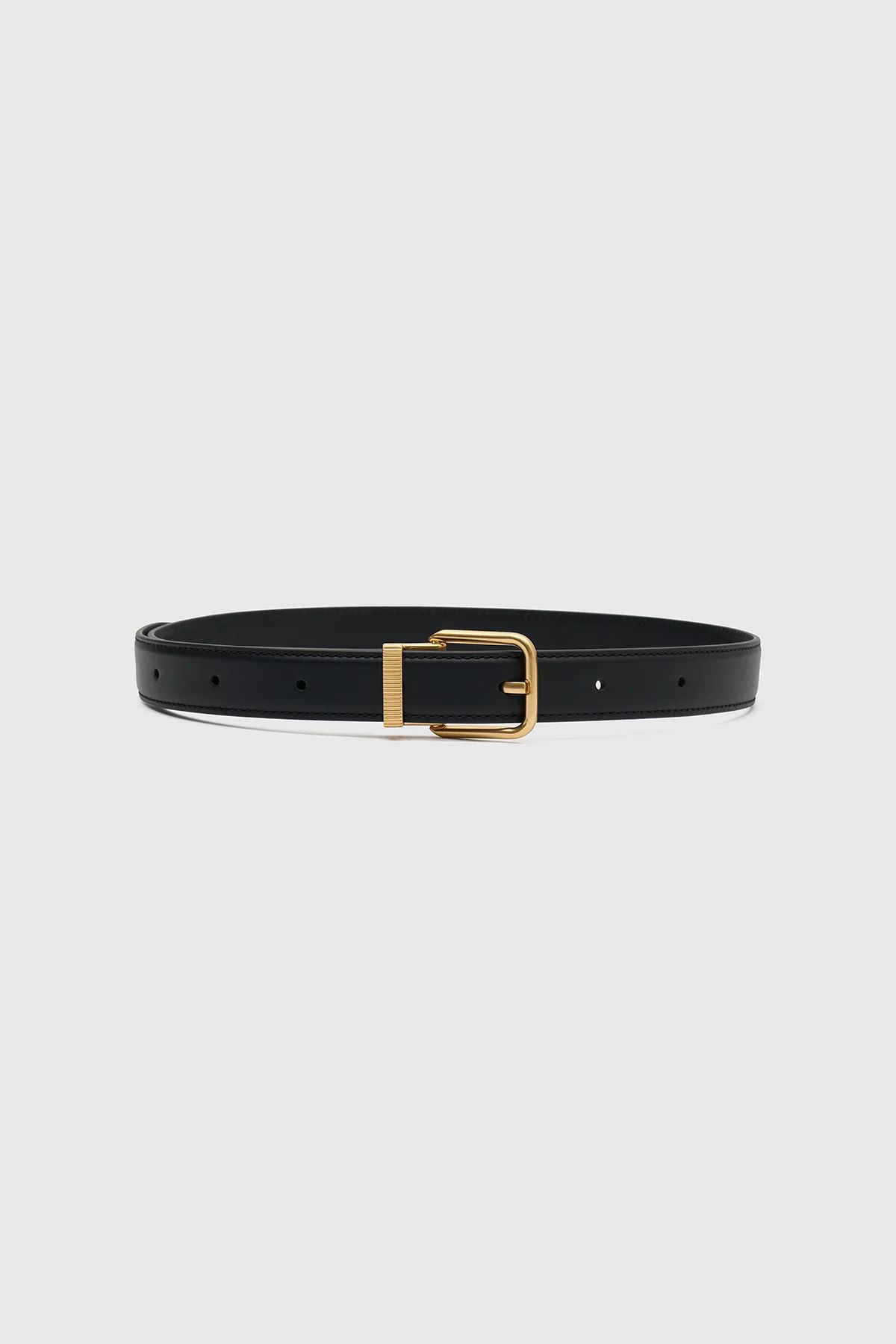 The Emersyn Belt is accentuated by a sleek gold buckle and complemented by a textured metal keep... | Camilla and Marc