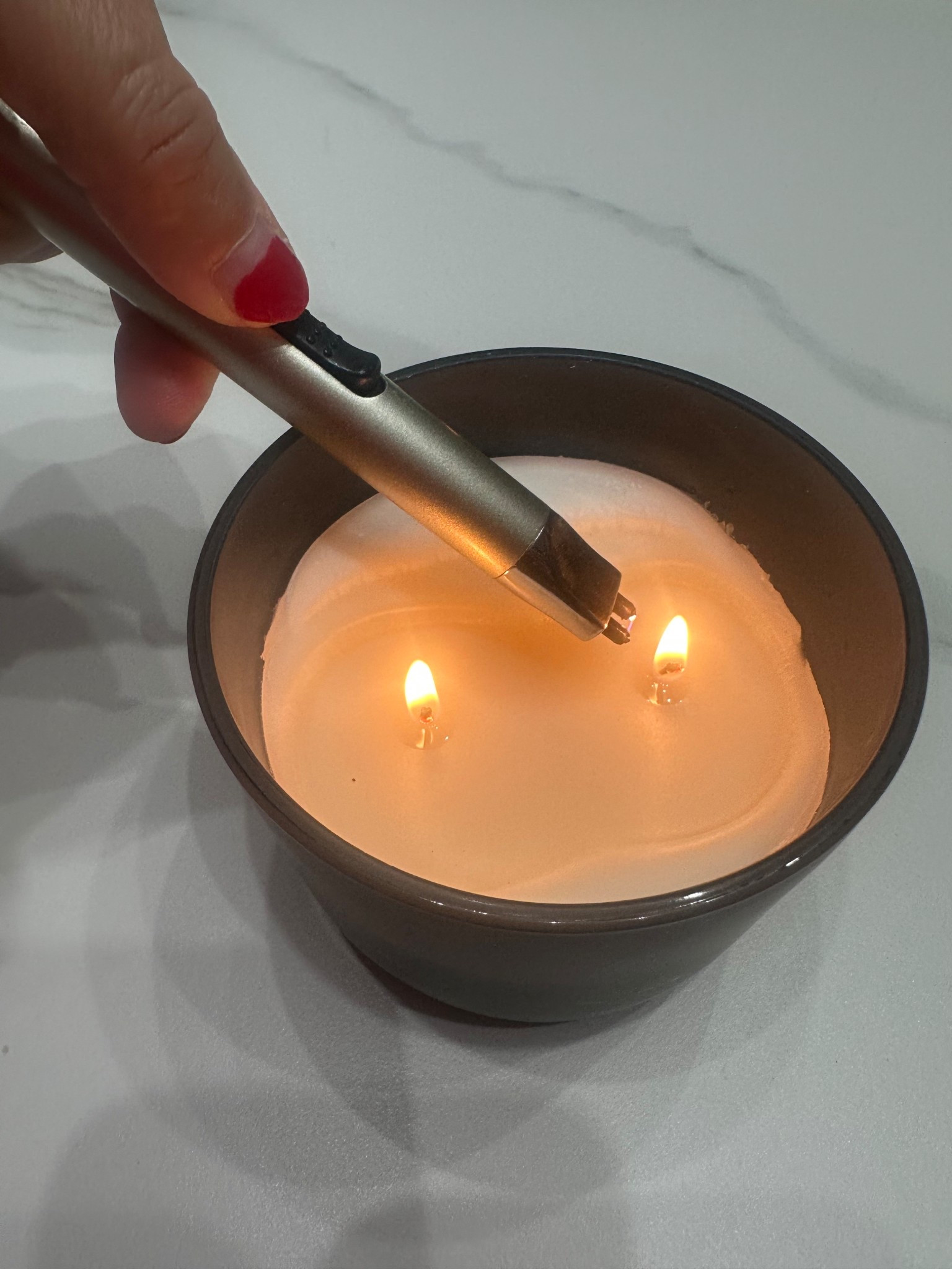 The coolest electric lighter for $7! Perfect stocking stuffer or gift! Paired perfect with this $10 candle - complete gift under $20!! 

#LTKmorningroutine #LTKGiftGuide #LTKFindsUnder50