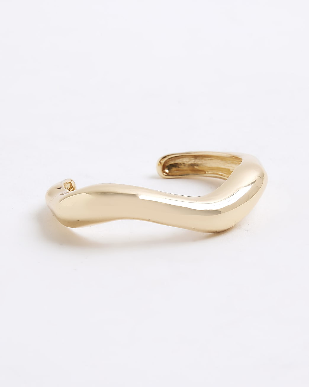 Gold Wavy Cuff Bracelet | River Island UK & IE