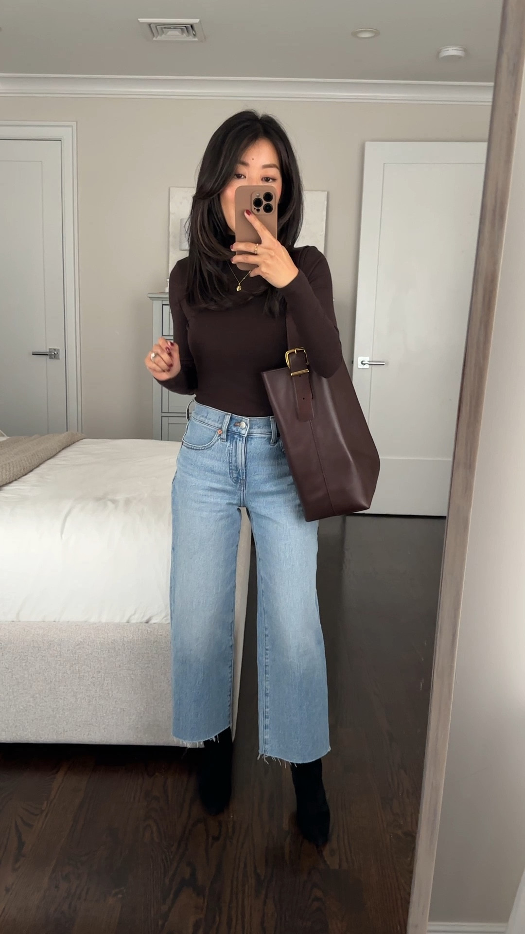 Sale alert + 4 of my top elevated staples to check out at Madewell! Best price I’ve yet to seen on this jeans with an additional markdown.

• Perfect vintage jeans 24 petite - Altoona wash . these are some of my most flattering jeans. I own them in the Vintage Canvas cream color as well. The petite length is great for styling with flats, wedges, booties or a low heel.

• Drapey Rib Long-Sleeve Mockneck top in dark carob xxs 

• Justine booties 5 - more comfy than any of their other booties IMO! nice quality and no breaking in needed with an elevated sleek look. slim stretch ankle shaft and zipper entry. My suede ones are not on sale but the black leather is 

• Essential bucket bag - great gift for her idea. perfect as a mom bag, school tote, for work -  fits a laptop and lots of stuff 

• mini locket is so dainty and pretty

Casual Fall outfits, cyber week deals  

#LTKCyberWeek #LTKGiftGuide #LTKSaleAlert