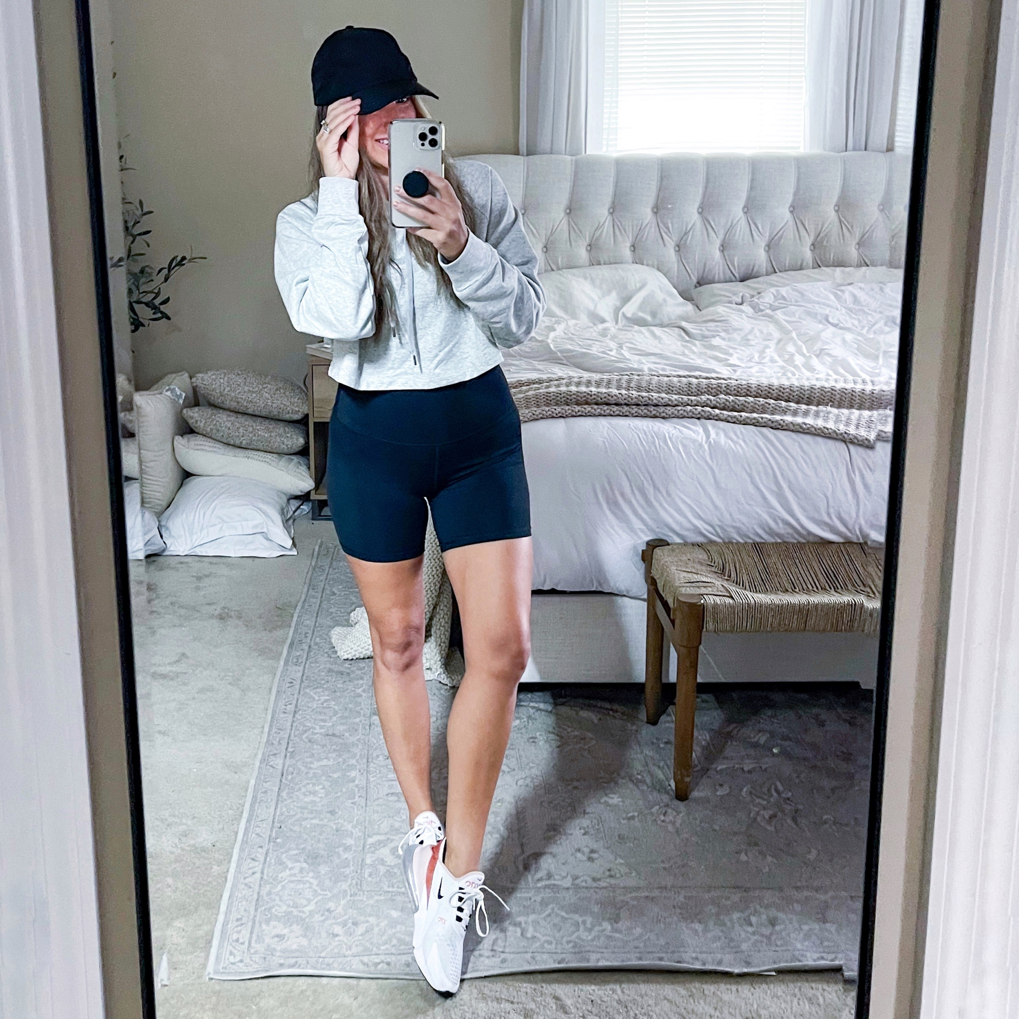 Casual outfit. Cropped hoodie (wearing a size medium). Nike sneakers and black hat.

#LTKSeasonal #LTKstyletip #LTKshoecrush