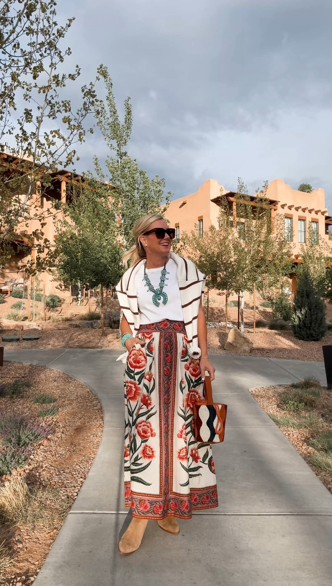 Obsessed with this whole look!

Wearing an xs tee & skirt, and small sweater  

#LTKOver40 #LTKFindsUnder50