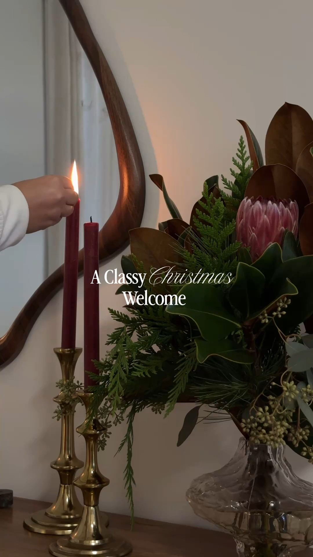 Keeping the entryway classic and simple this year — fresh flowers, a couple of festive touches, red candles for that timeless pop, and the sweetest little bow to finish it off. Sometimes the simplest details bring the most Christmas magic. ❤️🎄

#ClassicChristmas #ChristmasEntryway #HolidayDecor #EntrywayStyling #ChristmasAesthetic #HomeDecorIdeas #SimpleChristmasDecor #ElegantChristmas #RedAndGreenChristmas #FestiveTouches

#LTKSeasonal #LTKHoliday #LTKHome