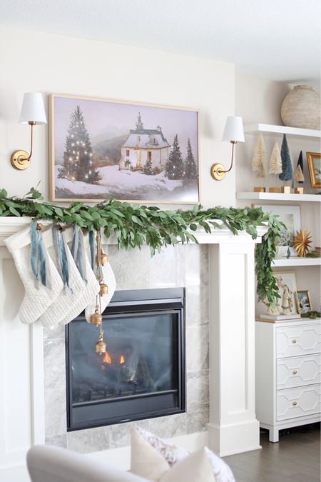Christmas decor, Christmas living room, holiday decor, pine garland, Christmas garland, stockings, frame tv art, home decor 

#LTKHoliday #LTKSeasonal #LTKhome
