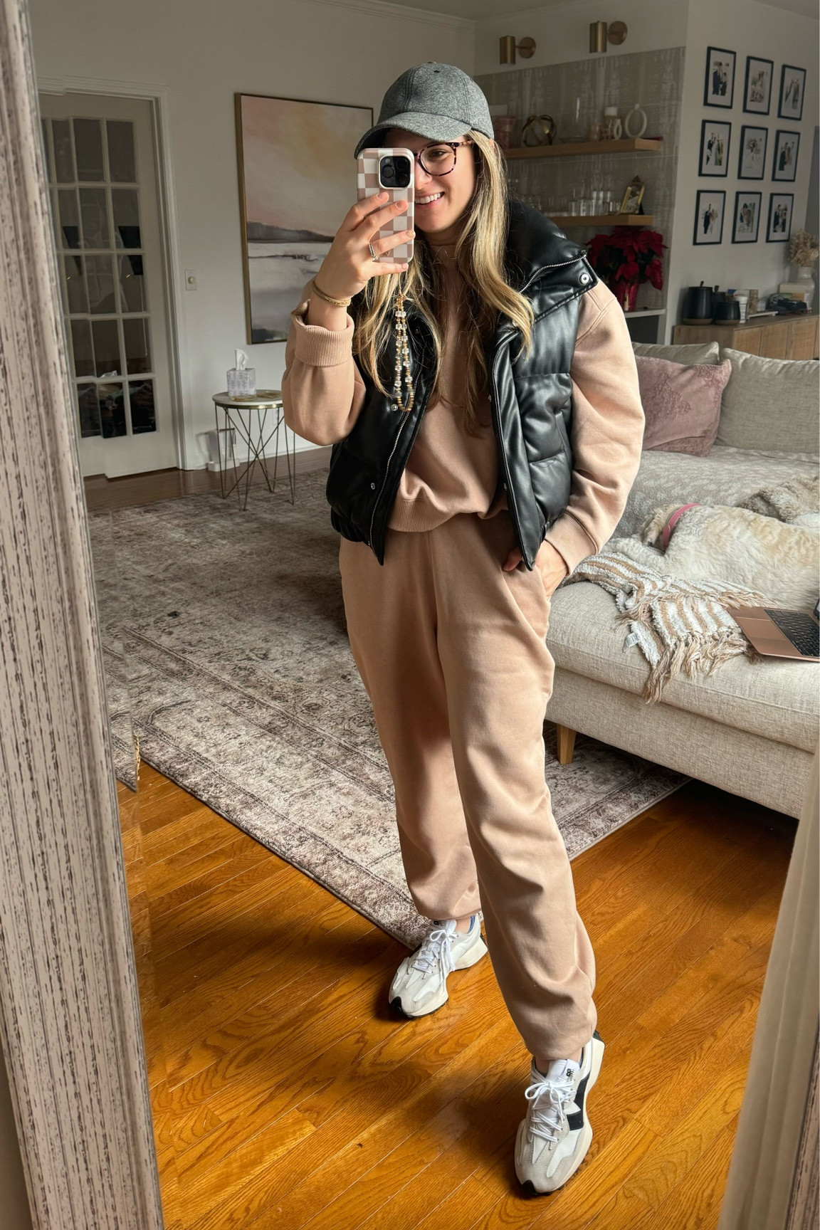 Everyday casual outfit 
Matching sweatset from nuuds 
Abercrombie leather puffer vest black leather vest 
New balance shoes 727 white and black sneakers 
Lululemon baseball hat 

#LTKstyletip #LTKsalealert #LTKfindsunder100