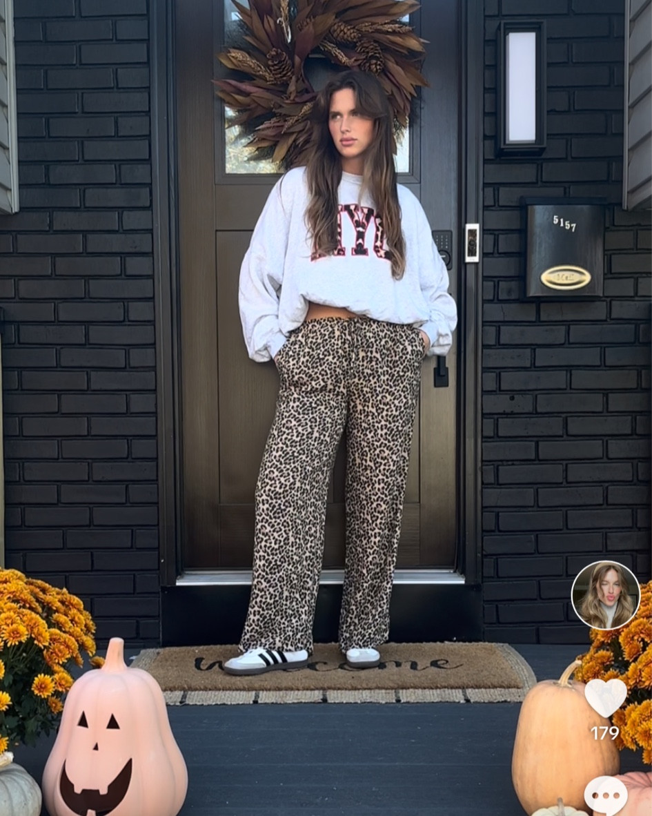 I love this leopard NYC crew! The pop of red is so pretty and Im loving everything cheetah lately. Pants are from TJ Maxx so I can’t link! 

#LTKSeasonal