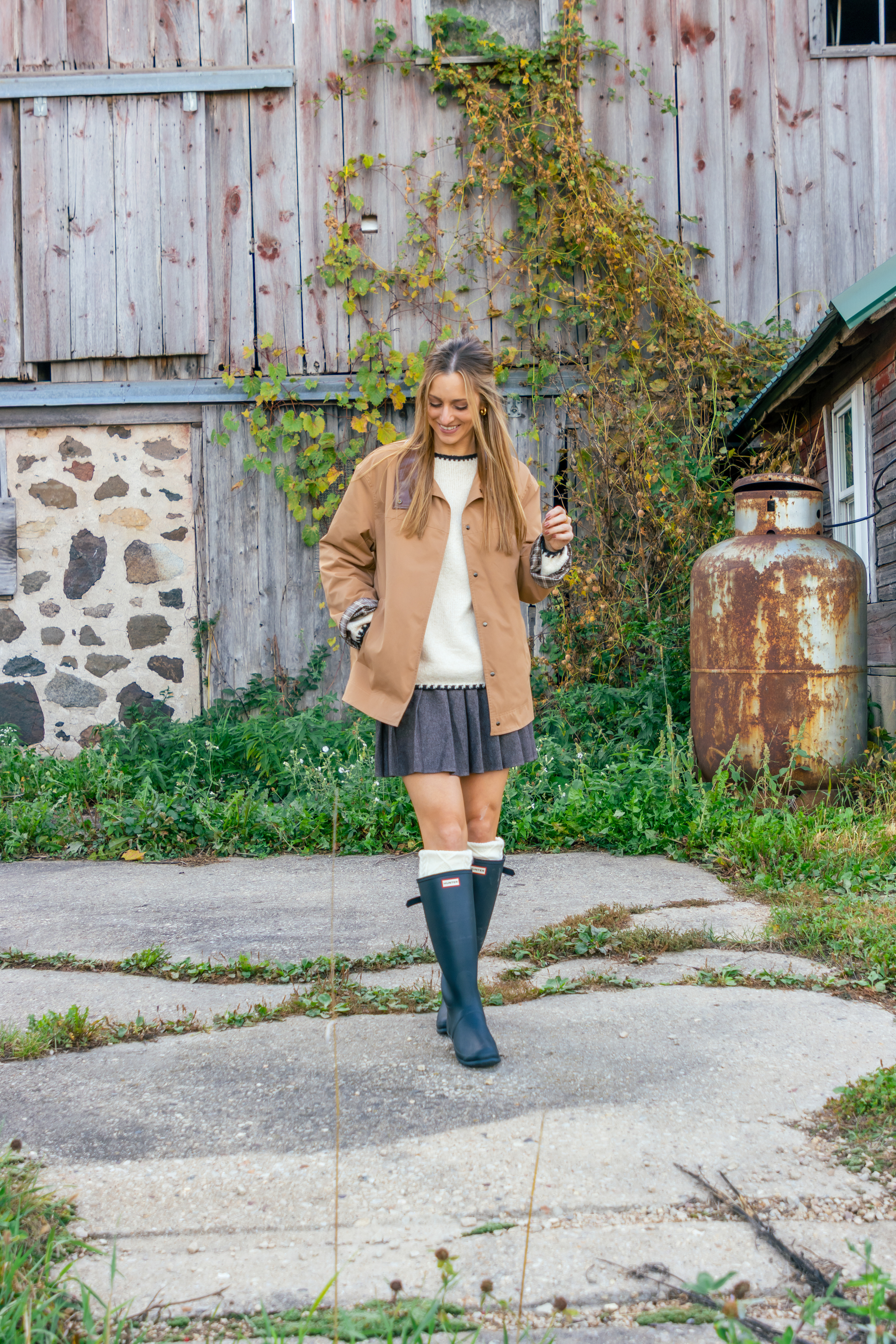 Perfect Fall Outfit for a Rainy Day! These boots and trench coat are must-haves for the fall season! I paired them with a cozy chunky knit sweater and pleated skirt. Stay warm and stylish.🌧️

Sizing Details:
Barn Jacket: Wearing size large
Skirt + Sweater: Wearing size medium
Hunter boots fit TTS.

 

 #LTKootd #LTKSeasonal #LTKOver40