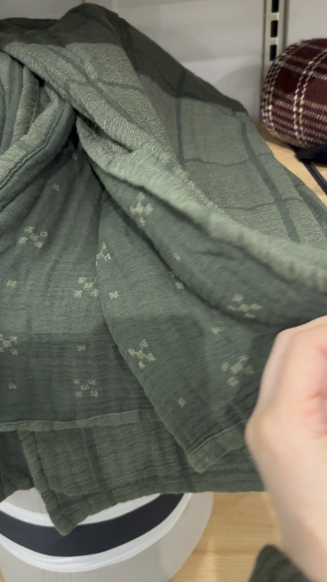 Green grid pattern matelasse blanket with pretty cross pattern on the other side 

#LTKHome #LTKSeasonal #LTKStyleTip