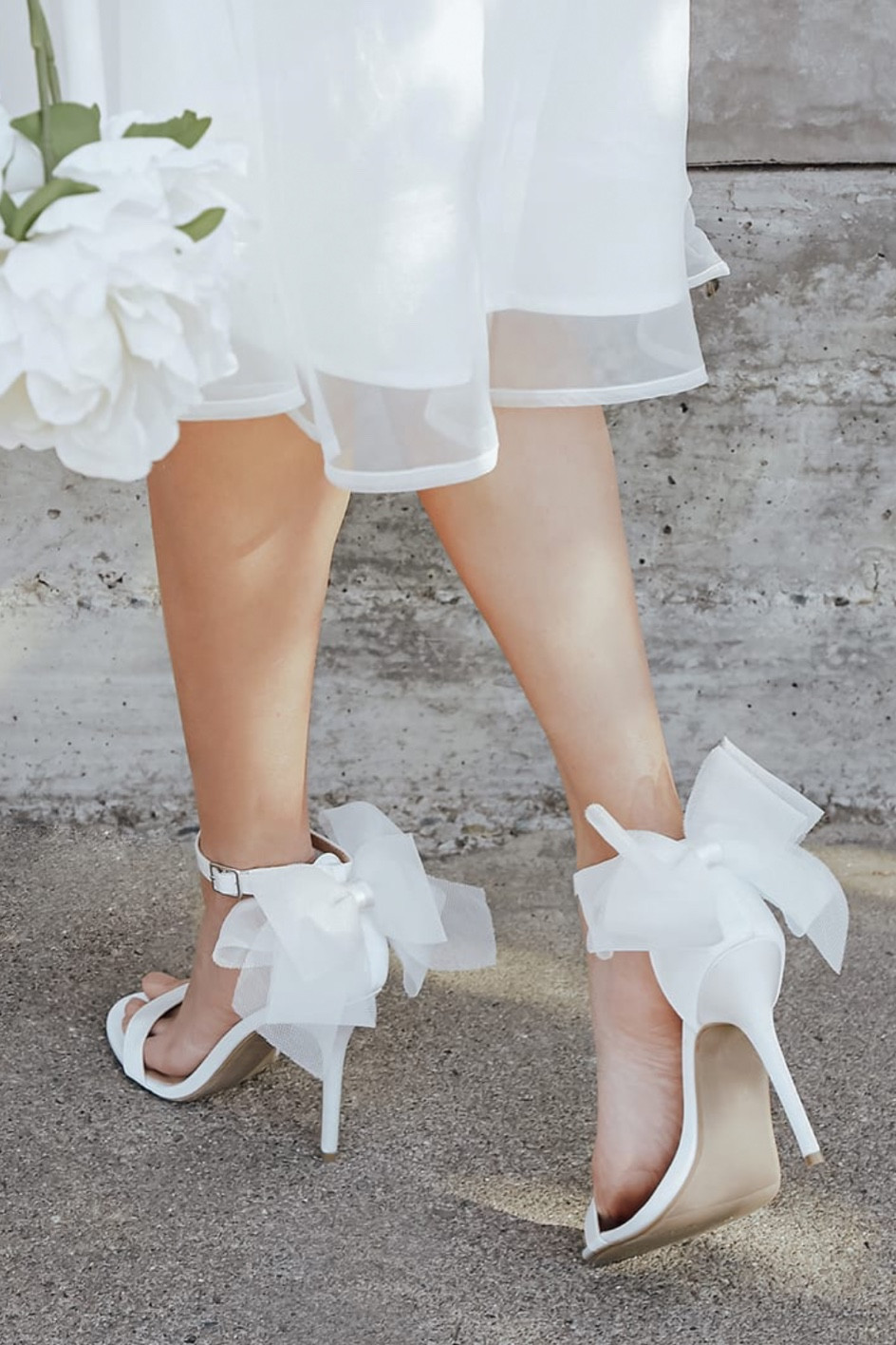 Wedding shoes, bride shoes, cute white heels with bows

#LTKunder50 #LTKshoecrush #LTKwedding
