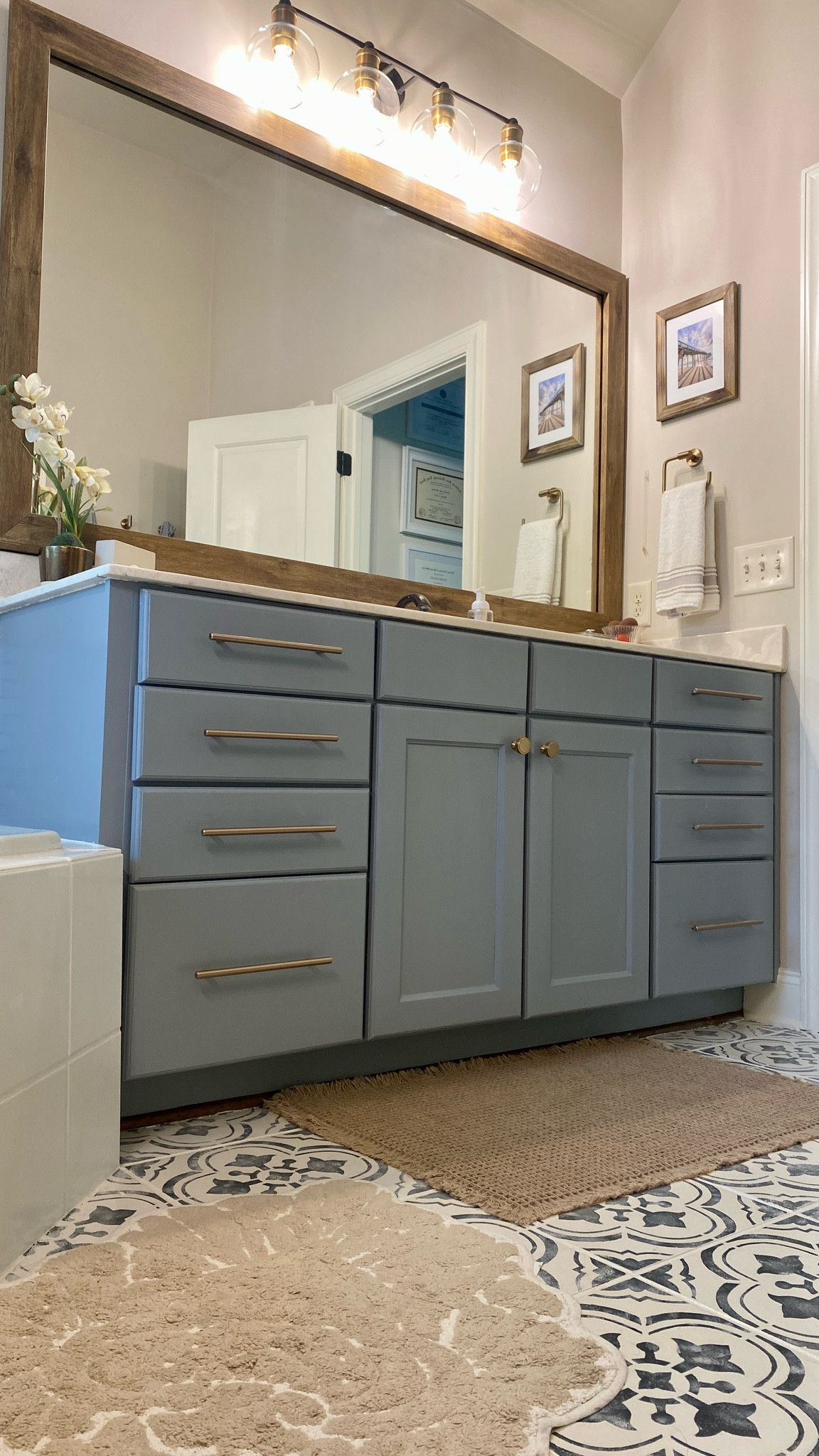 It’s all in the details! From new hardware to lighting and floor tiles, check out this dreamy master bathroom makeover!

Have you ever considered floor tiles in your bathroom? They’re pretty easy to DIY, let me know if you have any questions in the comments!

Bathroom remodel | floor tiles | bathroom hardware | bathroom vanity 

#LTKhome #LTKfindsunder100 #LTKfindsunder50