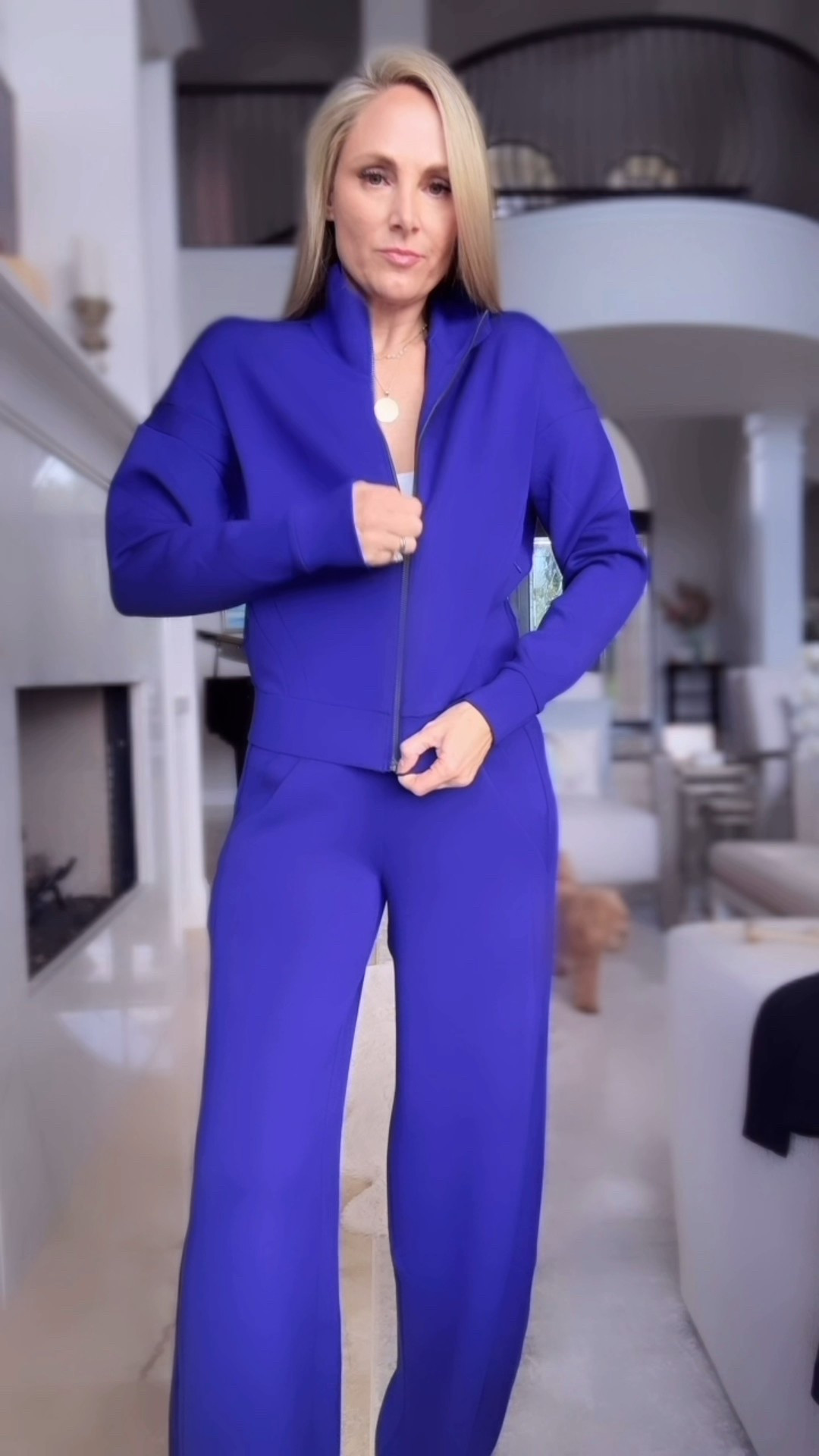 My absolute favorite air essentials tracksuit is currently almost 50% off the sale ends very soon grab it while it’s on sale. 🎉This color is stunning. I’m wearing a size small regular.🤯 this would also make the perfect holiday gift for your mom or mother-in-law!!!!! 🎁 

#LTKSaleAlert #LTKOver40 #LTKHoliday