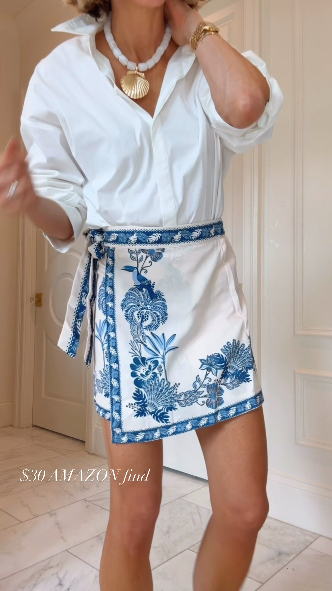 This printed wrap skirt from Amazon is so good. I'm wearing size small here fits tts 