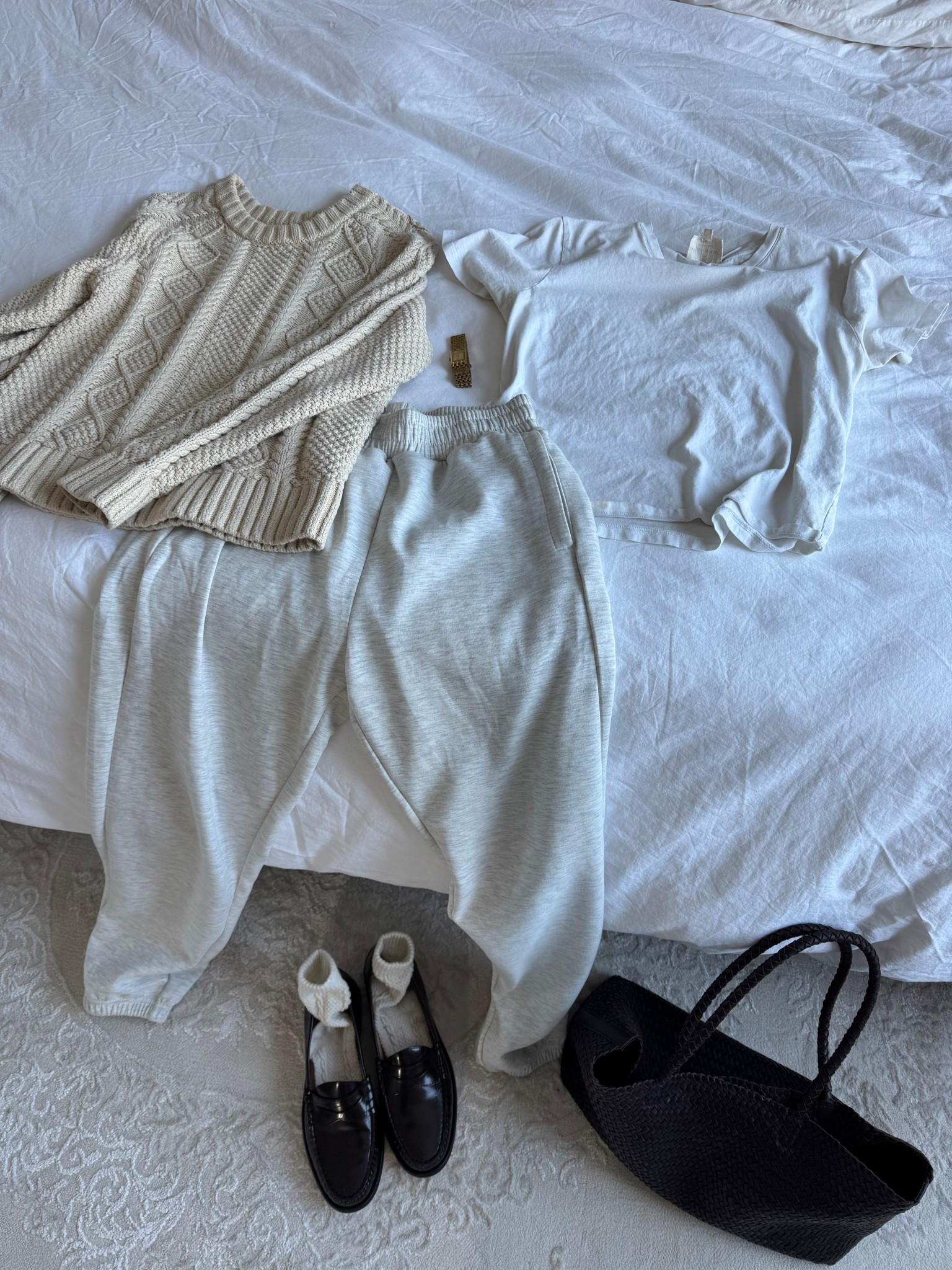 Casual outfit idea with joggers, loafers, woven tote bag, and a cable knit sweater 

#LTKootd #LTKgrwm