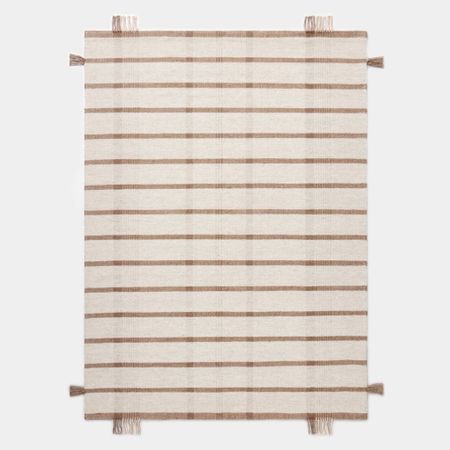 This woven rug comes in two sizes and is on sale at Target. 



#LTKsalealert #LTKhome #LTKfindsunder100
