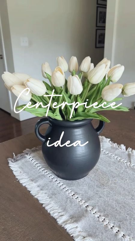 Spring summer centerpiece idea floral
arrangement with these Amazon faux tulips and Walmart black ceramic vase (pottery barn look for less). Note: the tulips smell like chemicals when they first arrive so I let them off-gas outside and now they’re fine. #walmarthome #amazonfinds #amazonhome 

#LTKunder50 #LTKhome