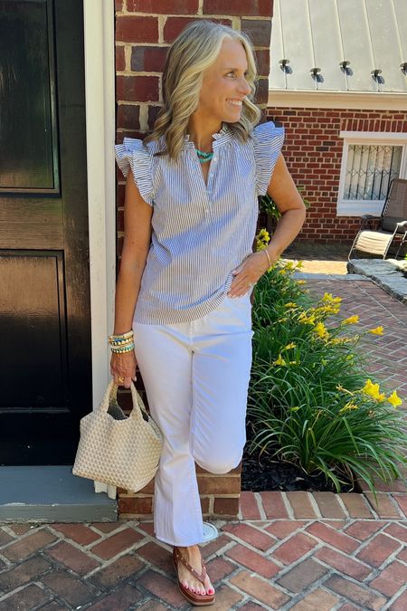 This cute top just released!! Love the wide hem and ruffles. Cute with white jeans, blue jeans, black pants…anything goes 
Wearing XS 
Code LISA10 
Use COAST20 on Allie + Bess

#LTKOver40 #LTKFindsUnder100 #LTKStyleTip