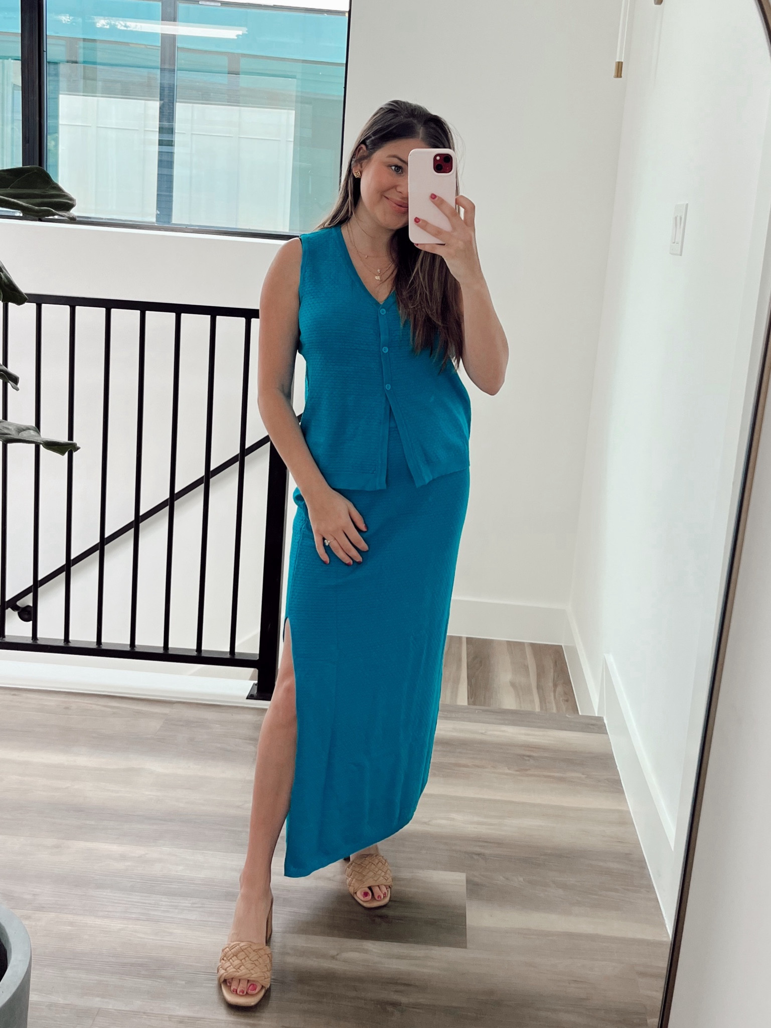 Loving this Amazon set that comes in 8 different colors and is under $40. It’s light and perfect for summer! Wearing a size small. Also if you’re a breastfeeding mama like myself, the buttons on the shirt are perfect. Iykyk 💙  I also think this would be cute with a little baby bump. 

V neck top. Button down vest. Button up vest. Turquoise set. Back set. Summer set. Knit summer set. Black set. Amazon finds. Beige set. Skirt with slit. Two piece set. Summer outfit. Beach set. Vacation outfit. 

#LTKfindsunder50 #LTKstyletip