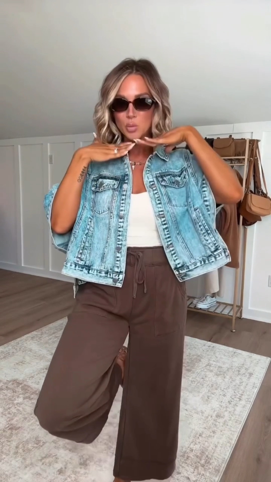 These designer-inspired pants are ridiculously comfy, the built-in bra tank (with removable straps!) is the perfect layering piece, and this poncho-style denim jacket pulls the whole look together. Perfect for that summer to fall transition weather that'll be here before we think about it 

I am 5'6 139lbs wearing size small pants, small tank, small denim jacket (color blue) shoes run 1/2 size big and also linking a similar pair of these shoes that I also own and love.  

 #LTKootd #LTKmomlife #LTKSeasonal