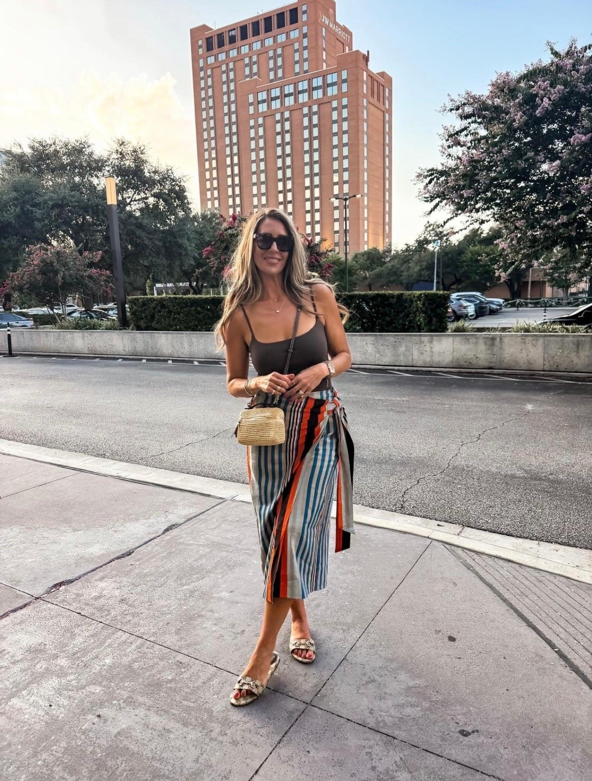 This wrap skirt is such a fun statement piece for summer. I paired it with a simple tank to let the colorful stripes shine, and the whole outfit feels effortless for vacation dinners, date nights, or resort wear. It’s one of those pieces that always gets compliments!

wrap skirt, striped wrap skirt, resort wear, vacation outfit, summer outfit, colorful skirt, vacation style, date night outfit, beach vacation fashion, women’s summer style, effortless outfit, themominstyle

#LTKootd #LTKSeasonal #LTKOver40