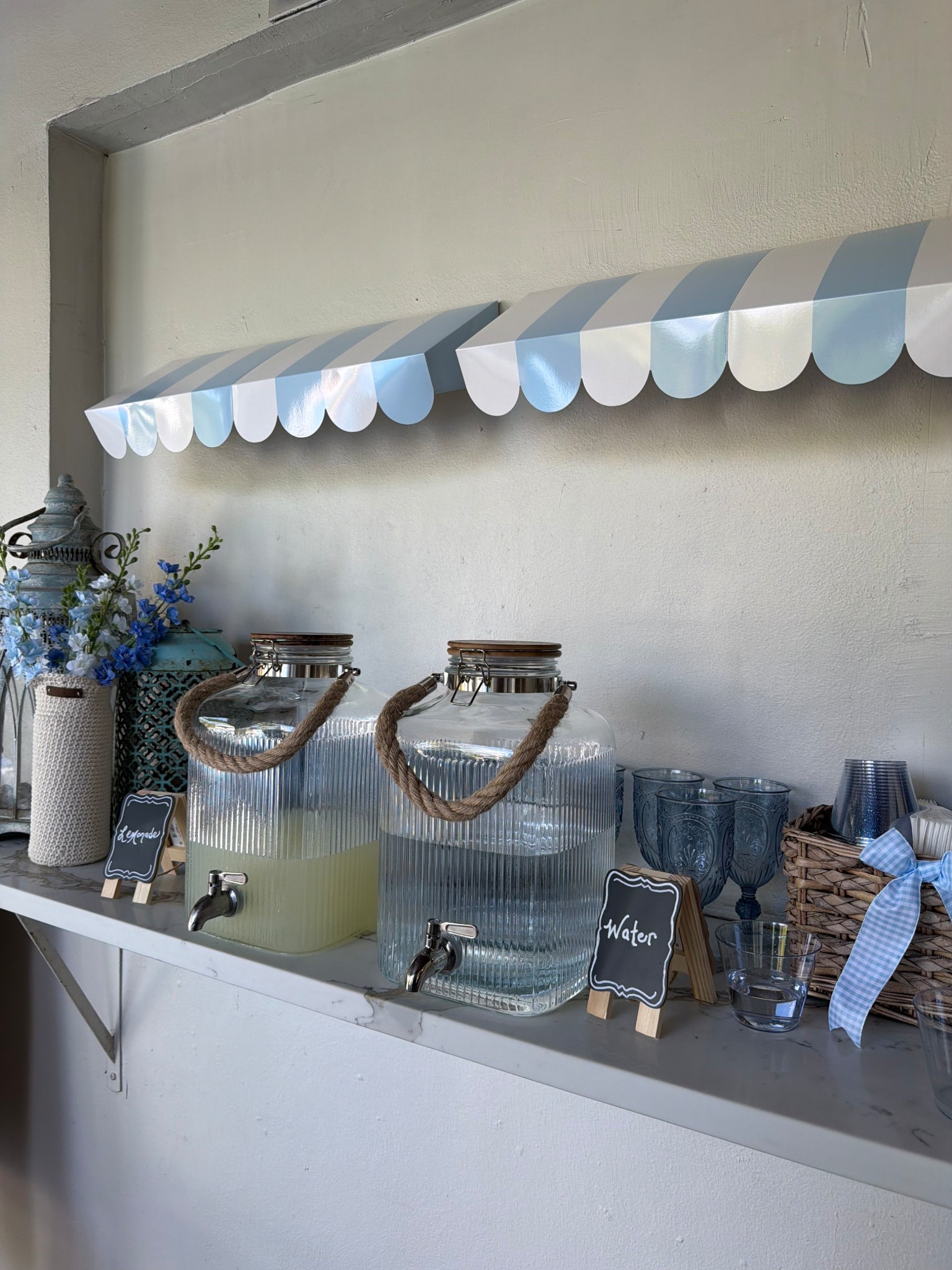 Baby shower drink station for party 

Lemonade 
Water 
Cafe
Baby shower 
Party decor
Wedding 
Paper awning 
Cottage 
Drink station 
Drink cart 
Event 
Amazon home 
Home decor 
Summer 
Spring 

#LTKHome #LTKBaby #LTKWedding