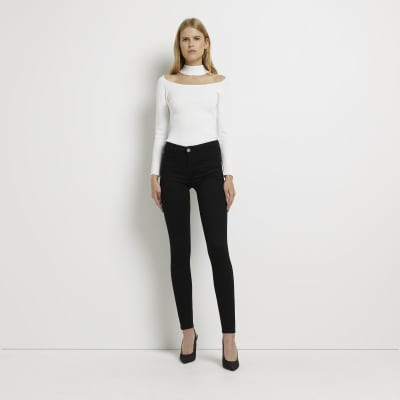 Black Molly low rise bum sculpt skinny jeans | River Island (UK & IE)