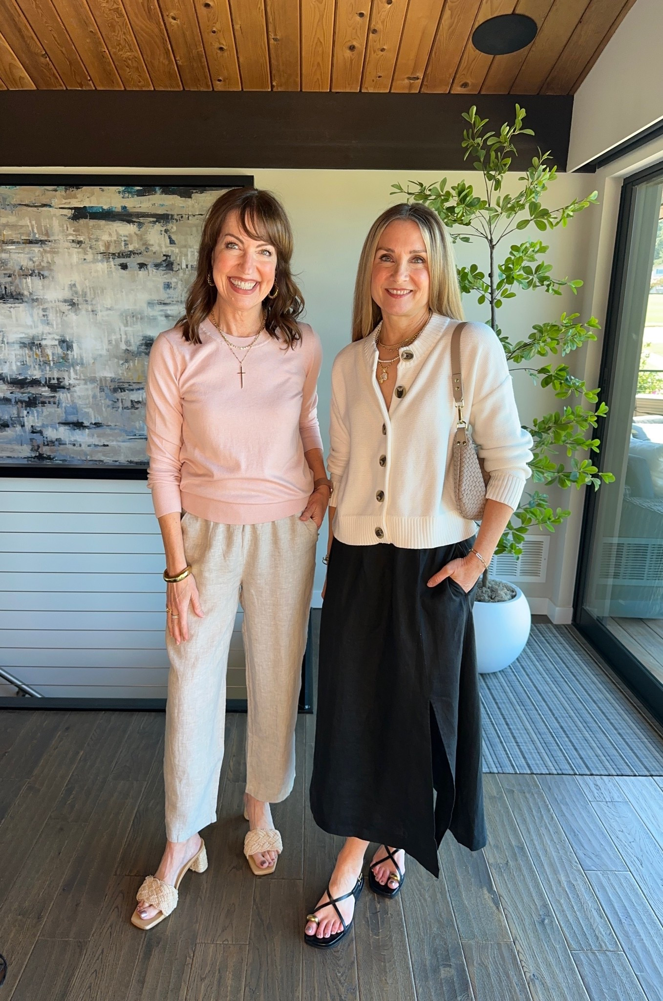 Must-haves for spring travel from @Quince ! 

We always need a light layer for chilly A/C and Krista’s lightweight cashmere crewneck (under $30!) in a soft pink and my crop cardigan go with everything!

Quince linen is top-notch and so affordable! Our linen pants and midi skirt and modern and so chic for everyday and travel. We’re both 5’6” and wear small in tops and bottoms. 
#quincepartner

#LTKOver40 #LTKTravel #LTKootd