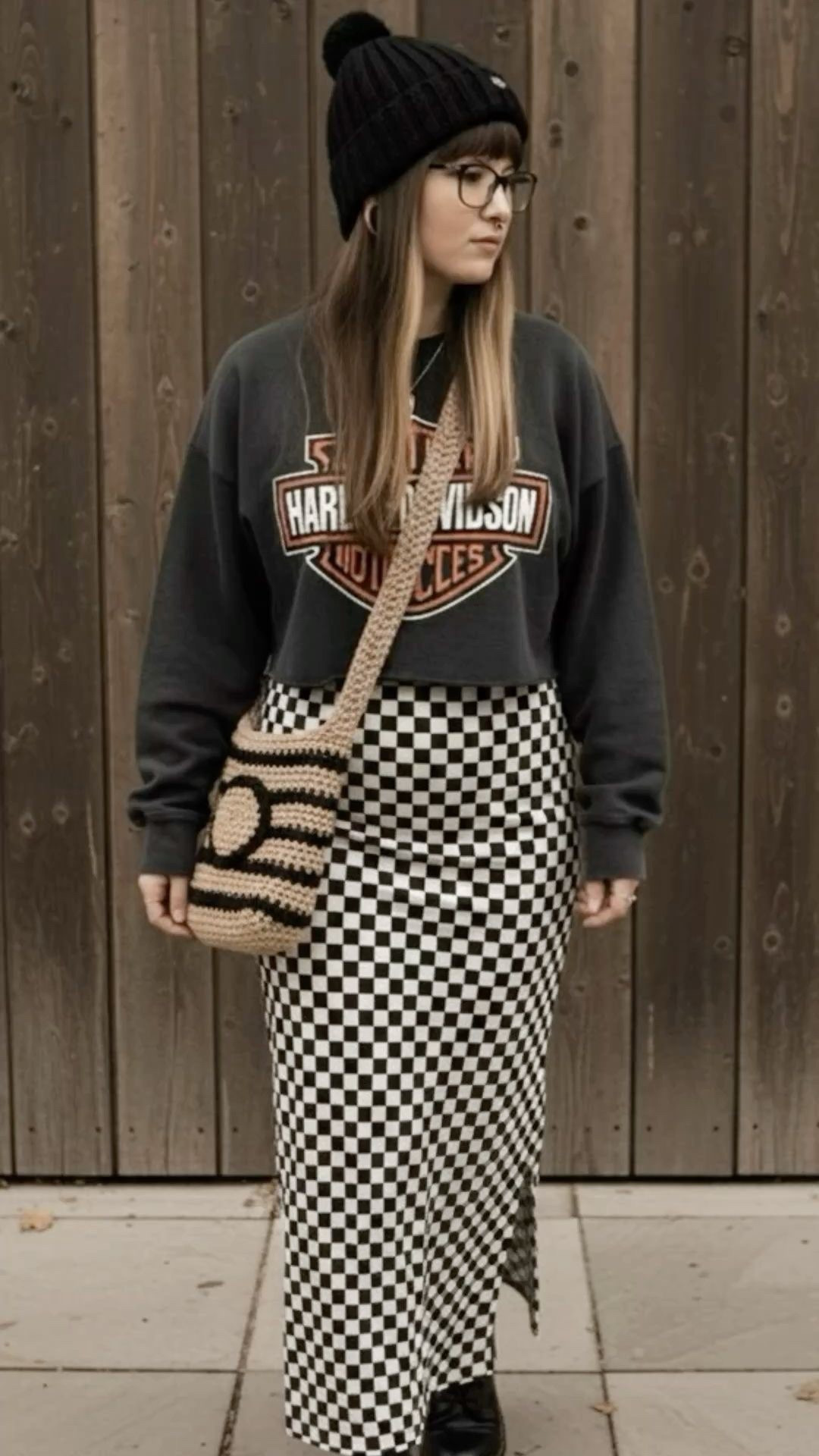 Obsessed with this mix of textures and patterns! Pairing a cropped vintage-inspired Harley Davidson sweatshirt with a checkered maxi skirt for that perfect "cool girl" aesthetic. I’ve styled it with a handmade crochet crossbody bag to add a soft touch to the edgy vibe. Perfect for transitional weather or a casual weekend out.

#LTKootd #LTKgrwm #LTKMidsize