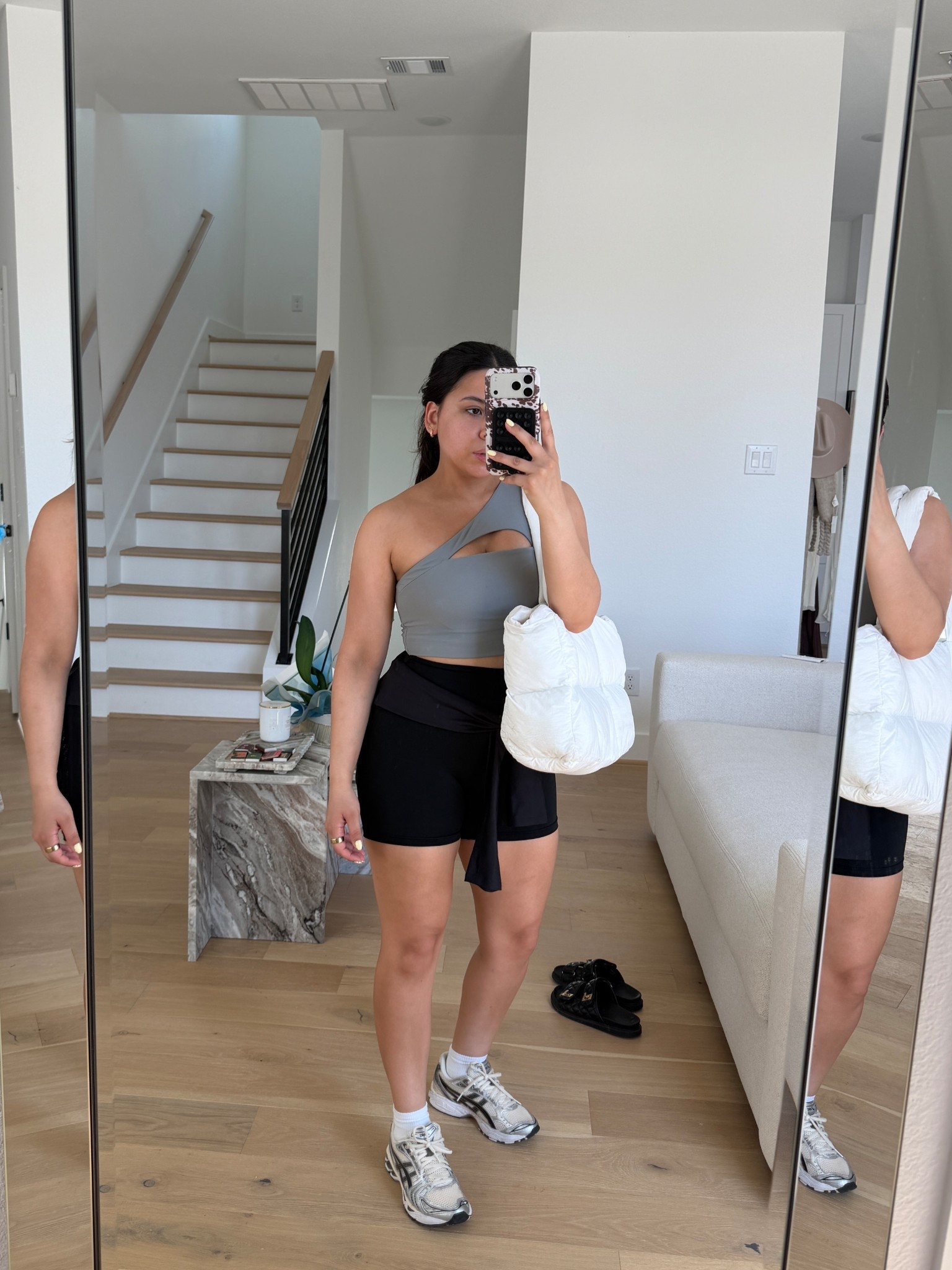 Sports bra: small
Biker shorts: small
Sneakers: 6.5 women 
Workout zip jacket: xs 
Ankle socks 
Puffer tote bag 

#LTKgrwm #LTKootd #LTKActive