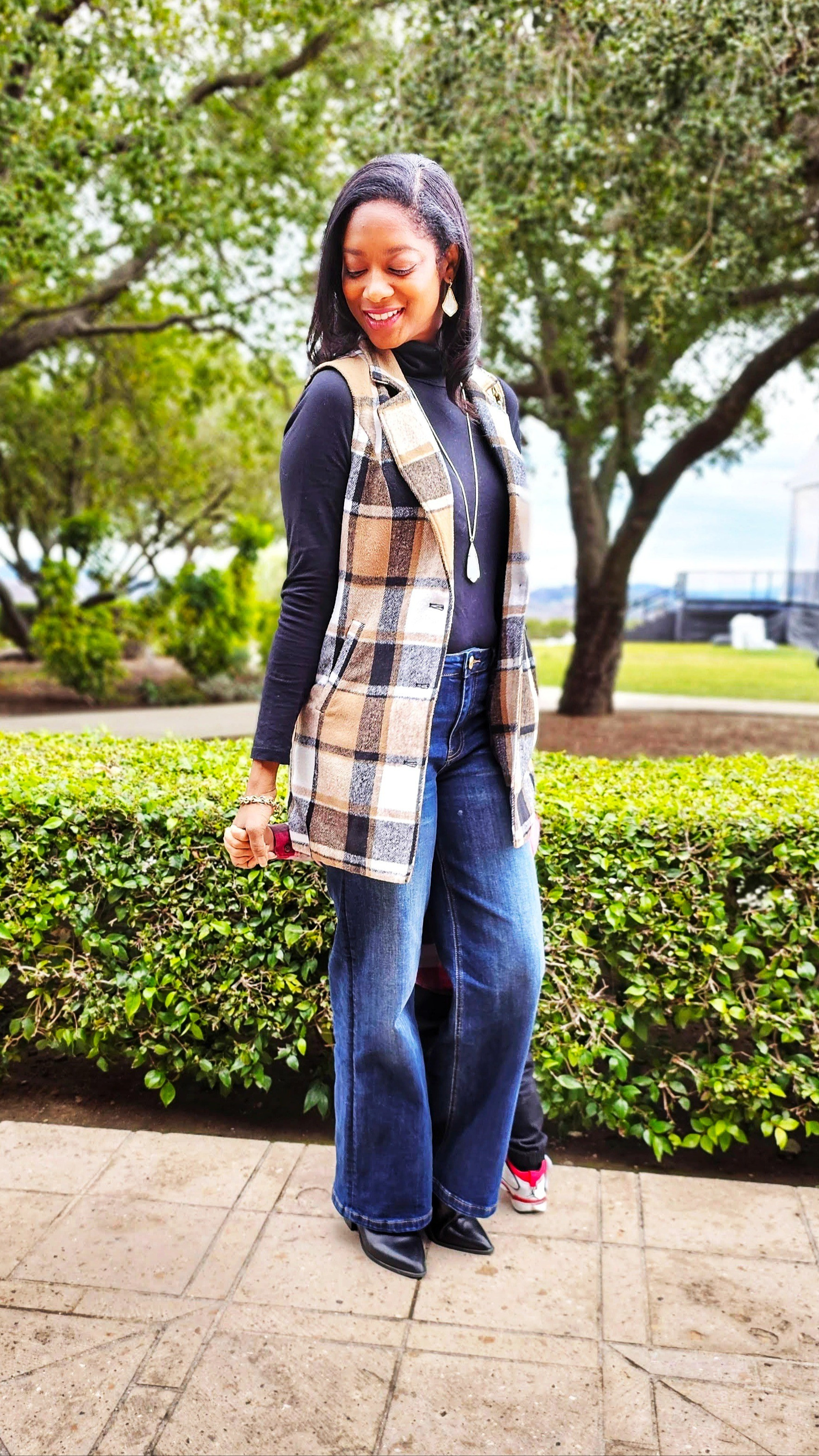 #Plaid, but make it stylish! I love a warm vest for fall and winter. The fit and length of this one looks fabulous when paired with wide leg jeans. 

#LTKSeasonal #LTKSaleAlert #LTKFindsUnder50