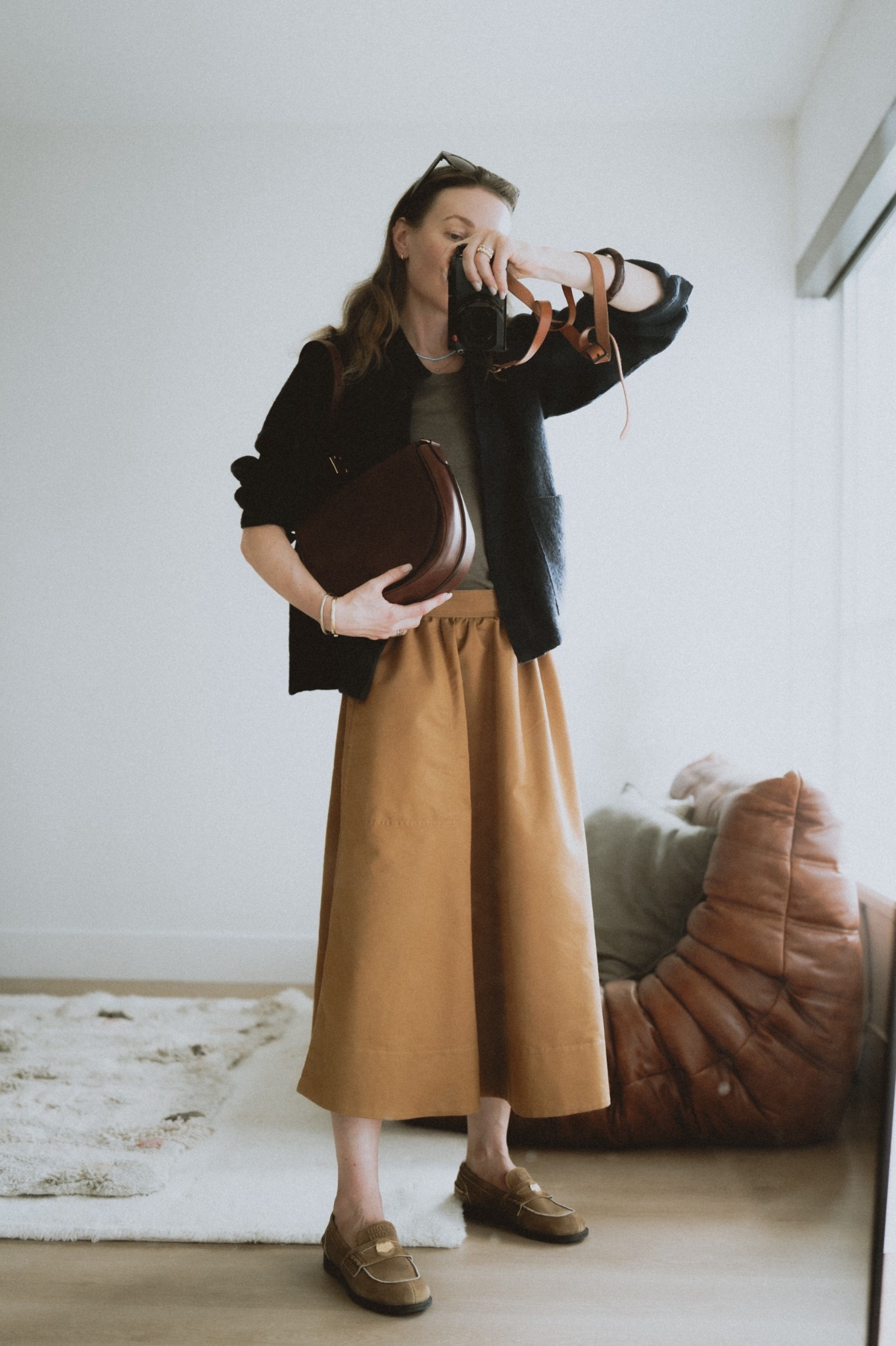 OOTD: a-line skirt + tank top + cardigan + saddle bag. Miu Miu loafers 👞☺️

#LTKSeasonal #LTKStyleTip #LTKWorkwear