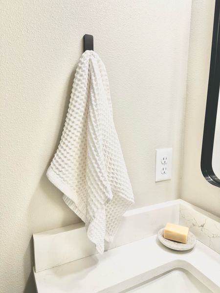 I love having a hook for hand towels in the bathroom! Use a command hook and you’re good to go! I also love this soap for my face wash. Amazing ingredients !

Bathroom design, bathroom decor, bathroom towels, bathroom styling, decorating tips

#LTKhome #LTKstyletip #LTKfindsunder50