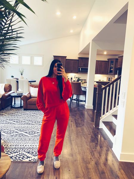 House uniform
Red Adidas Sweatsuit
Small in sweatshirt
Small on joggers
COOTD
tracksuit
Joggers
Travel outfit
Loungewear
High waisted joggers
Black & white rug
Black chandelier
Upholstered dining chairs

#LTKfit #LTKHoliday #LTKhome