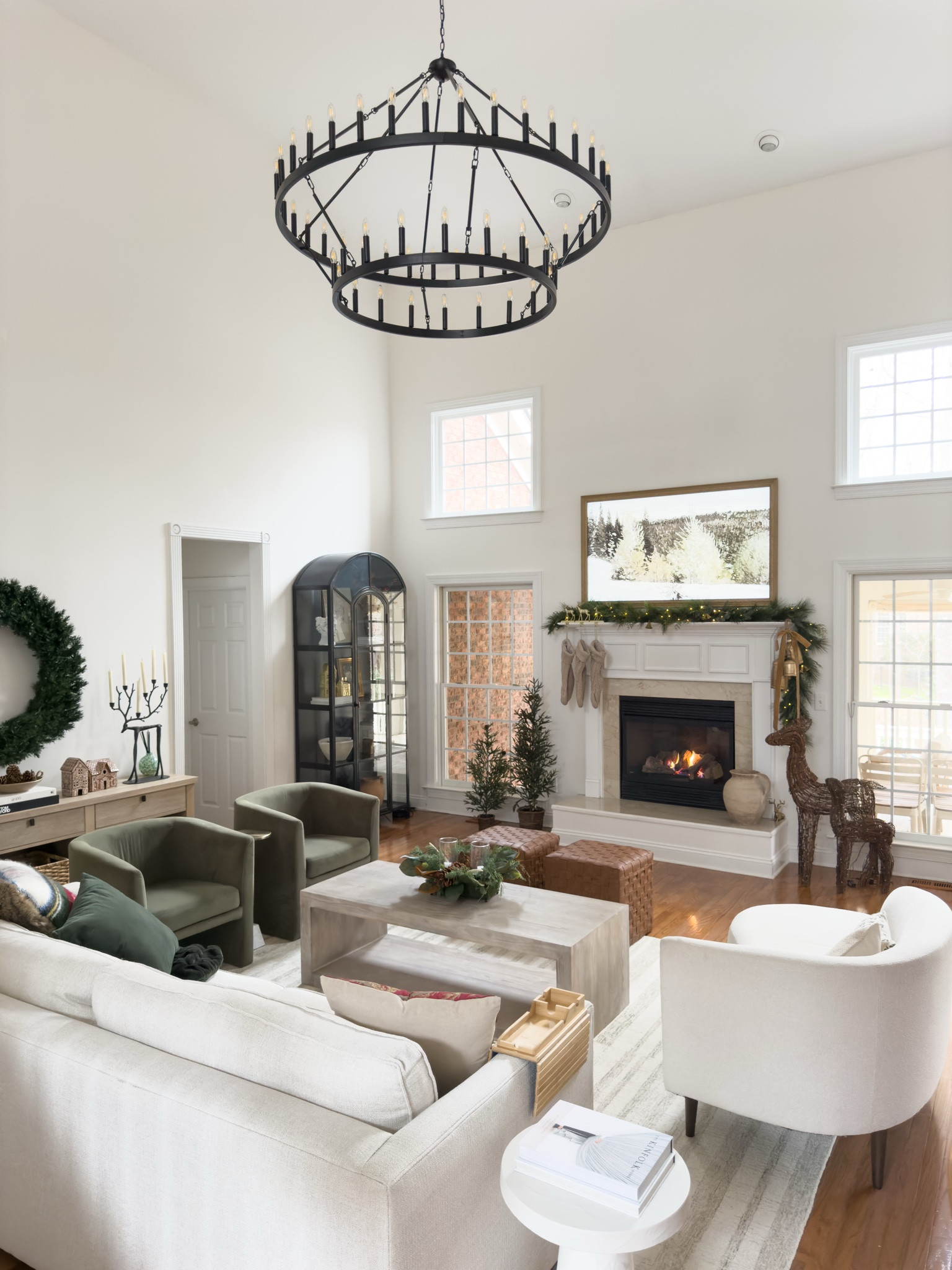 New living room chandelier! Love this $400 version, which compares to a very similar one over $4,000! Also linked the scaffold we used and our neutral living room decor



#LTKHome