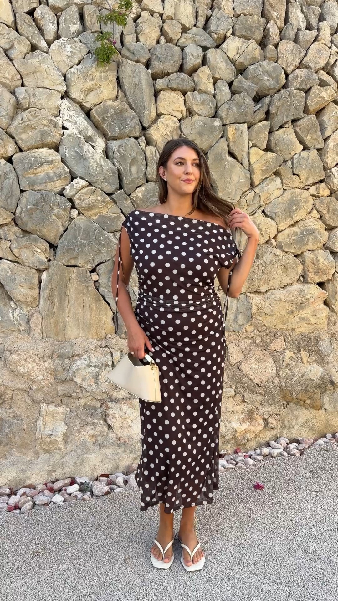 Chocolate polka dot dress for European summer nights

polka dot dress, brown polka dot dress, chocolate brown dress, off shoulder dress, midi dress, vacation outfit, European summer style, Amalfi Coast outfit, resort wear, vacation dress, dinner outfit, summer dress, elegant vacation look, coastal chic, feminine style, neutral sandals, mini handbag, travel outfit, date night outfit, summer fashion

#LTKWedding #LTKTravel #LTKSeasonal