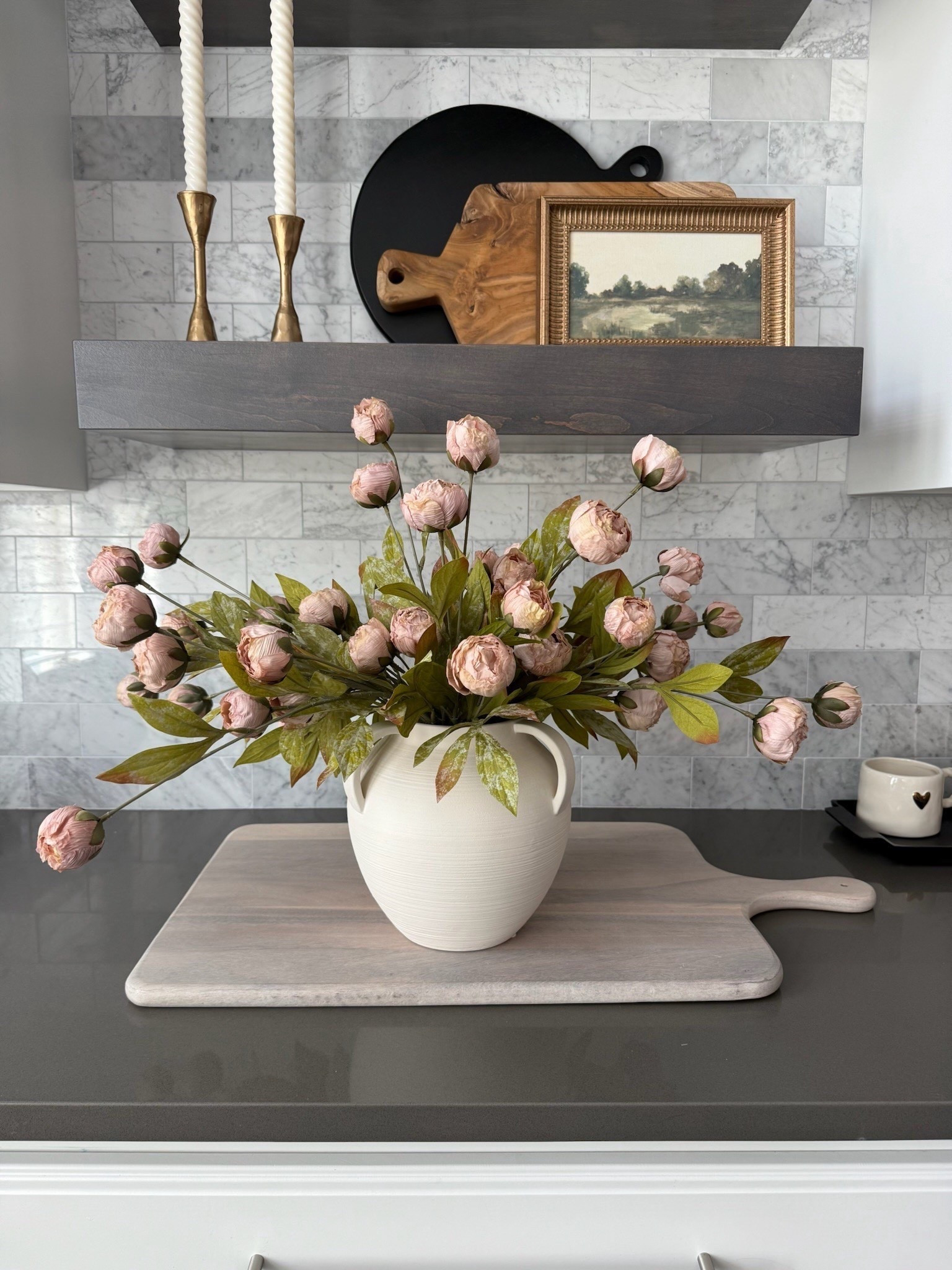 I have tagged some vases that look a lot like my sold out version! Hopefully someday it will go back in stock 😅

#fauxstems #peonies #kitchendecor #modernkitchendecor #neutralkitchendecor #homefinds #fakeflowers #ceramicvase 

 

#LTKSeasonal #LTKHome #LTKFindsUnder50