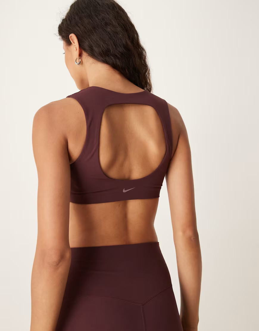 Nike Training Zenvy light support sports bra in burgundy-Red | ASOS (Global)